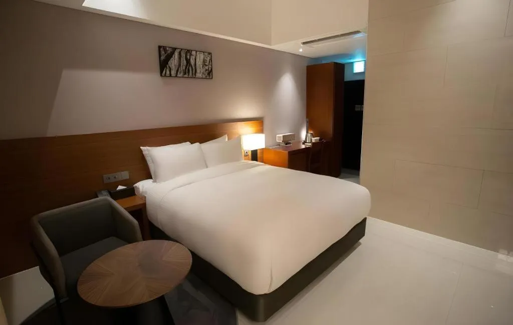 Bed in Top Cloud Hotel Iksan