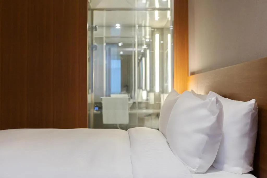 Bed in Top Cloud Hotel Iksan