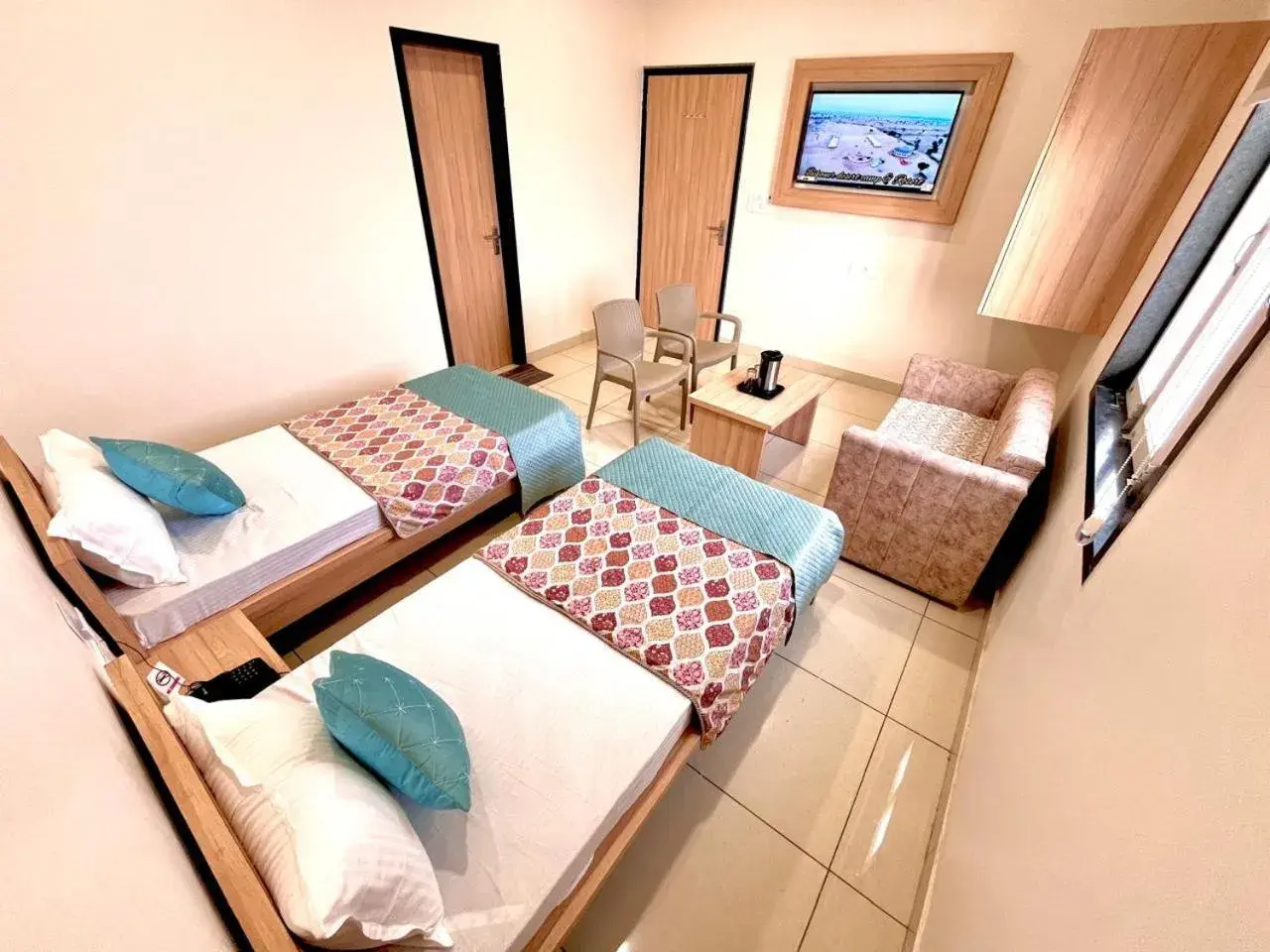 Living room, Bed in Hotel Rajvi Residency A Unit Of Jas Hotels And Resorts Living room, Bed in Hotel Rajvi Residency A Unit Of Jas Hotels And Resorts