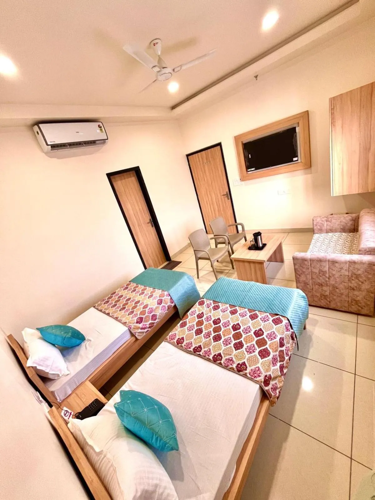 Bed in Hotel Rajvi Residency A Unit Of Jas Hotels And Resorts