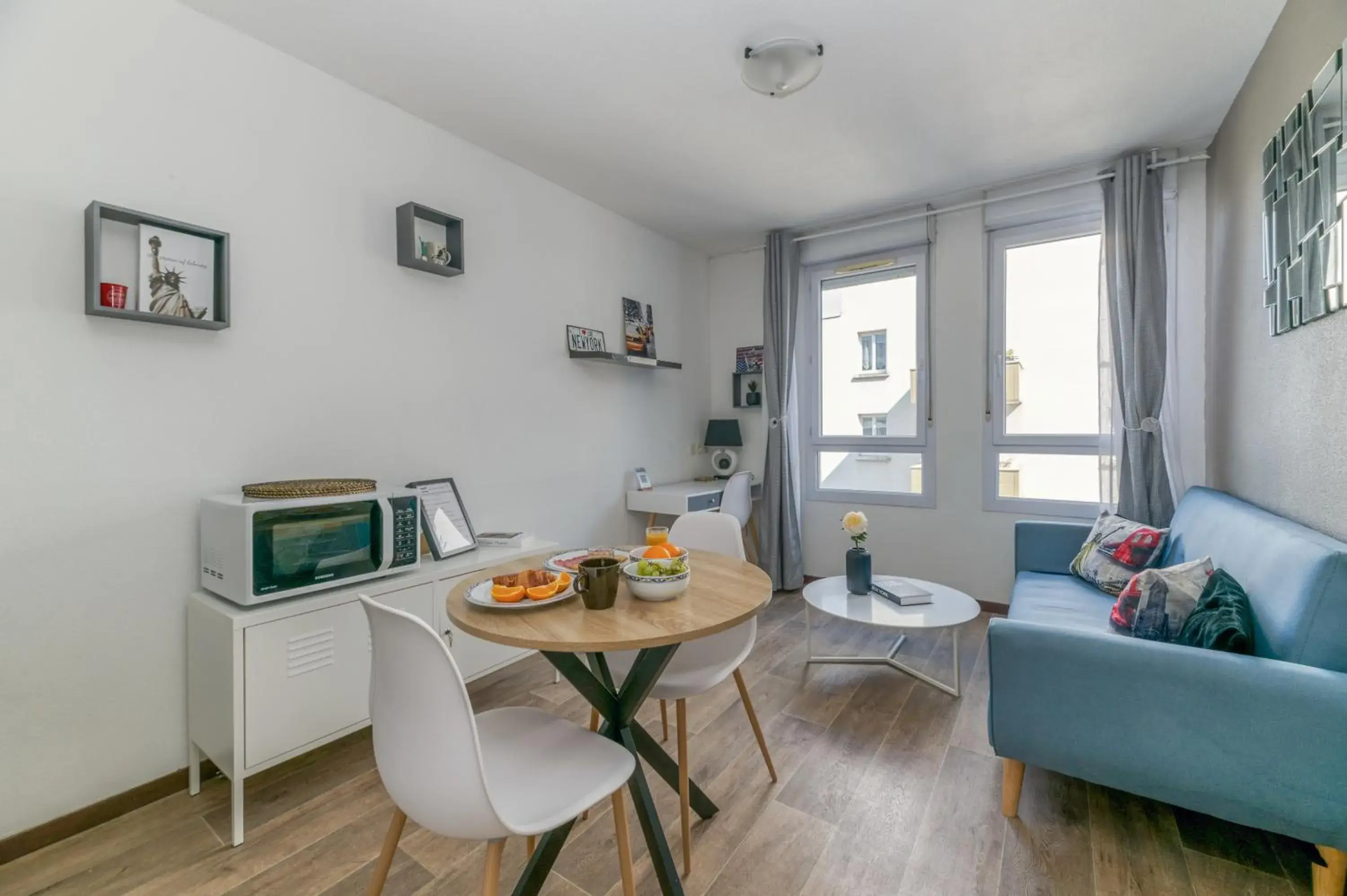 Living room in R'Apparts T2 Le New York Living room in R'Apparts T2 Le New York