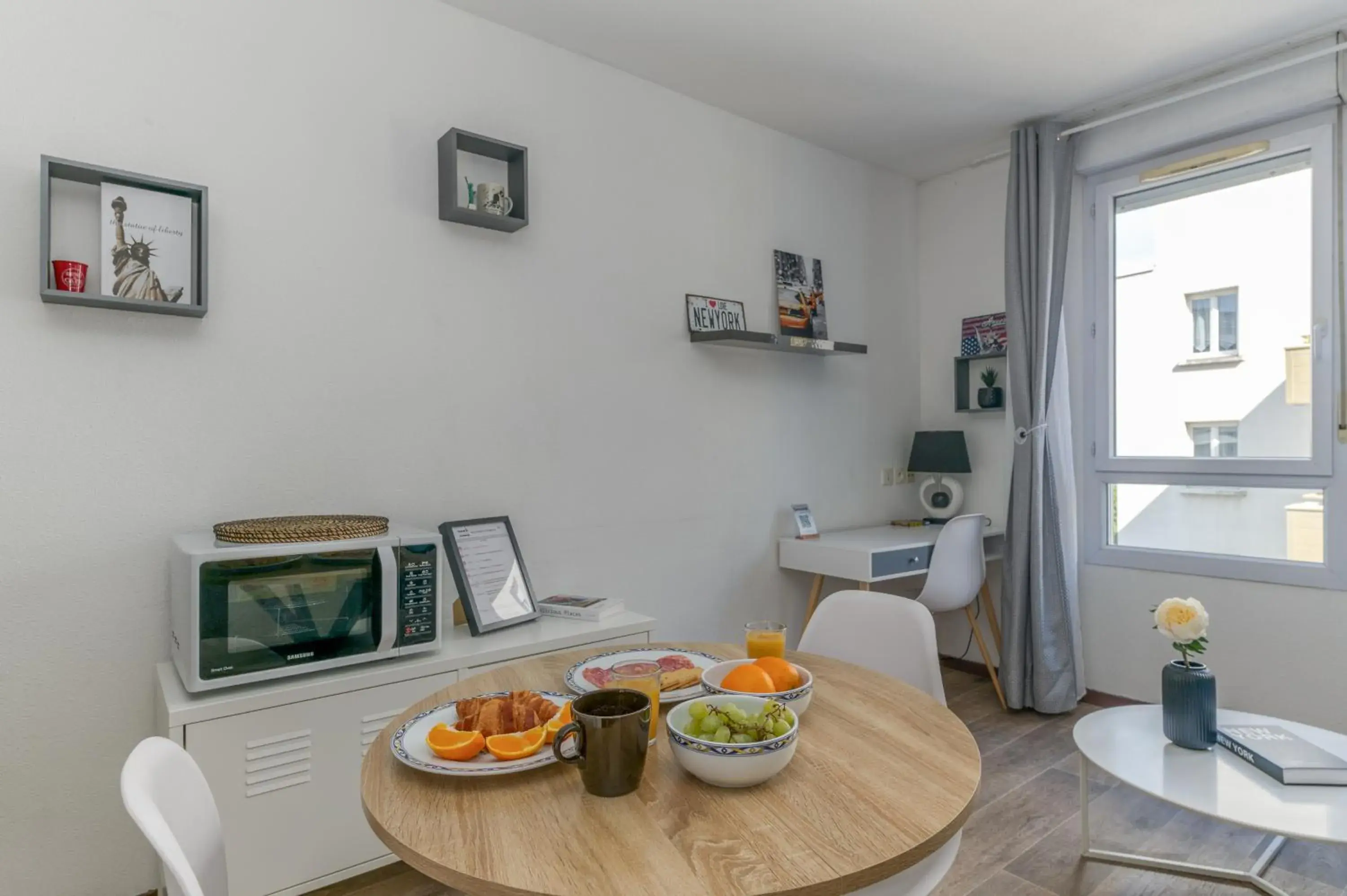 Living room in R'Apparts T2 Le New York Living room in R'Apparts T2 Le New York