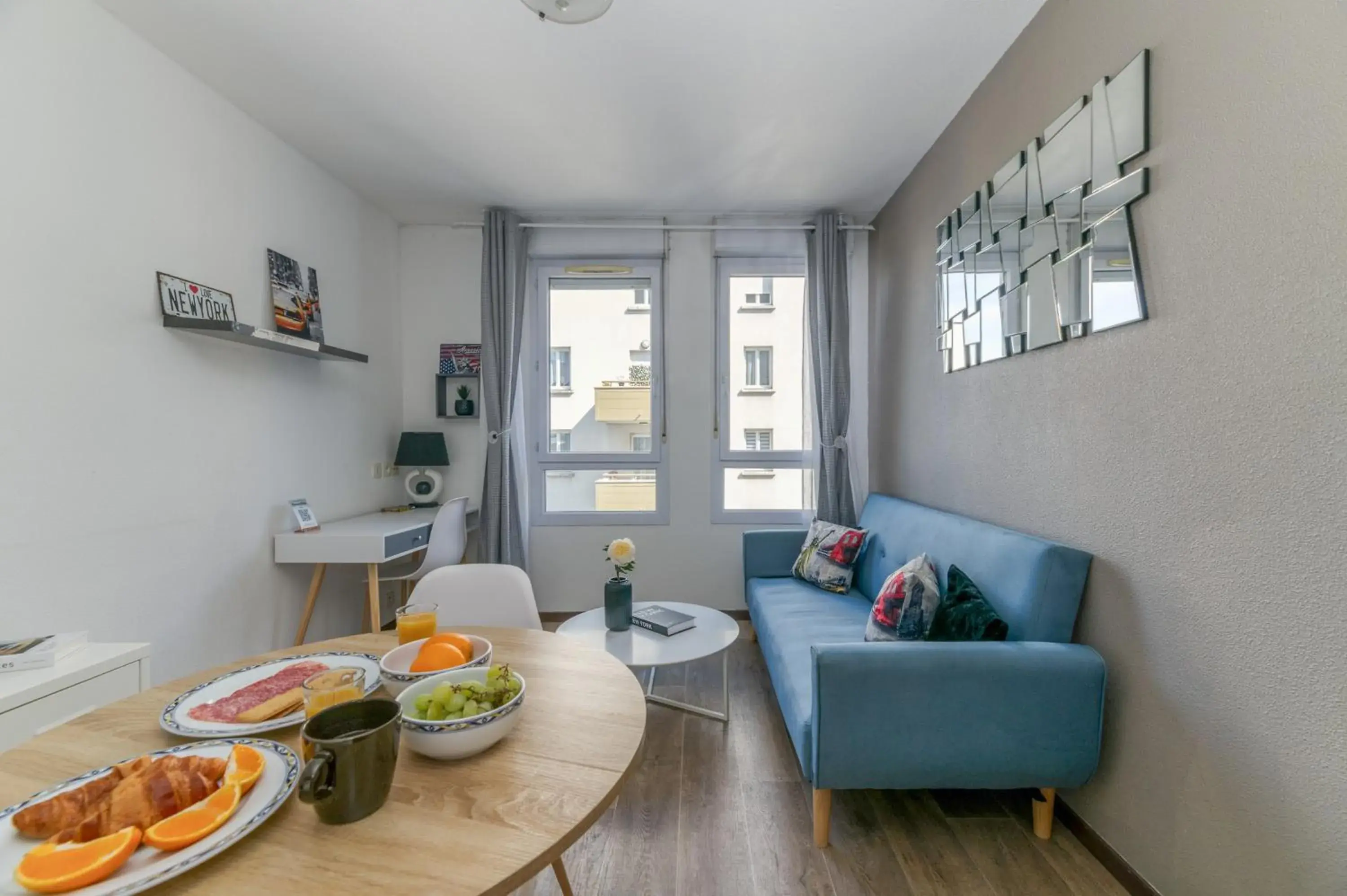 Living room in R'Apparts T2 Le New York Living room in R'Apparts T2 Le New York