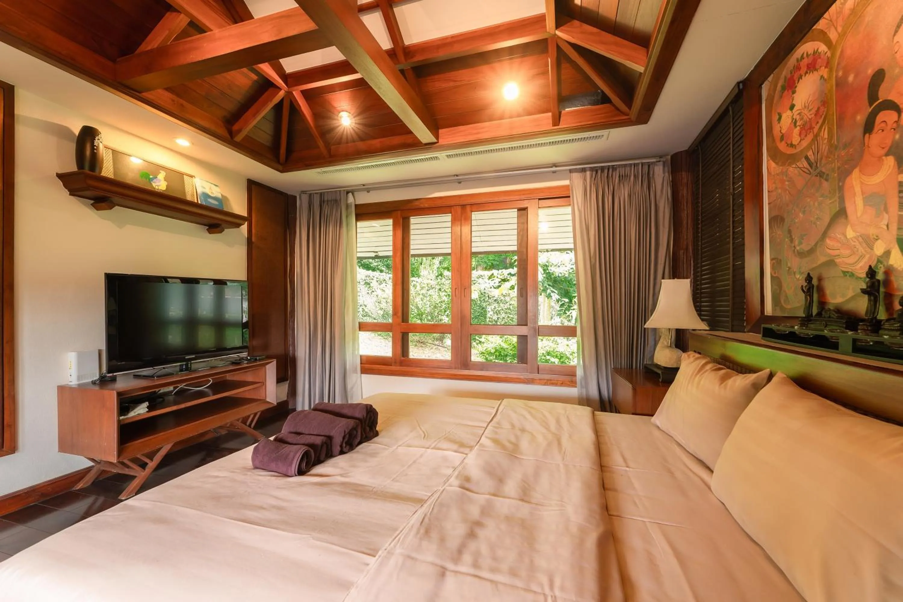 Bed in Guru Resort Chiang Mai