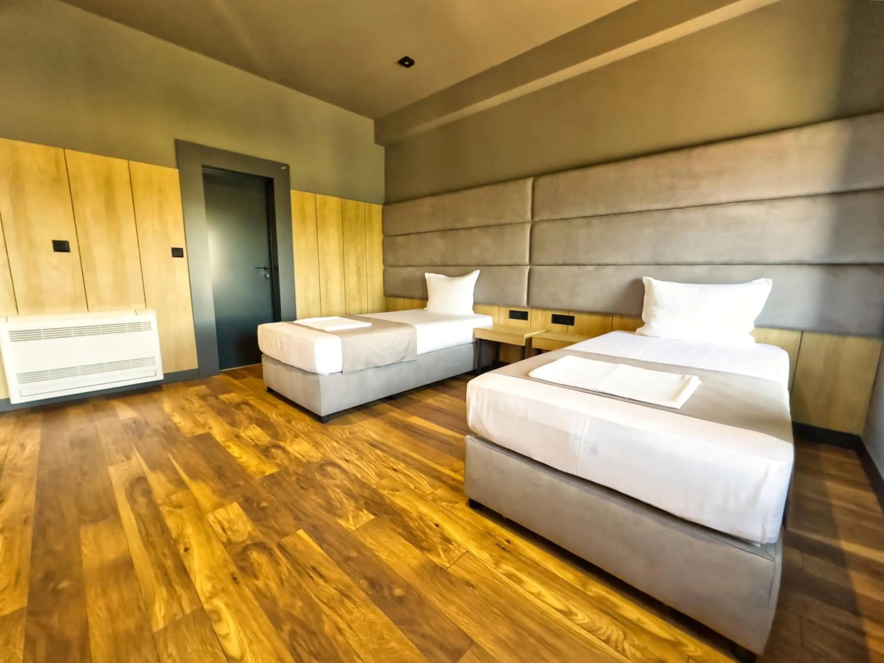 Bed in VIGOR Hotel