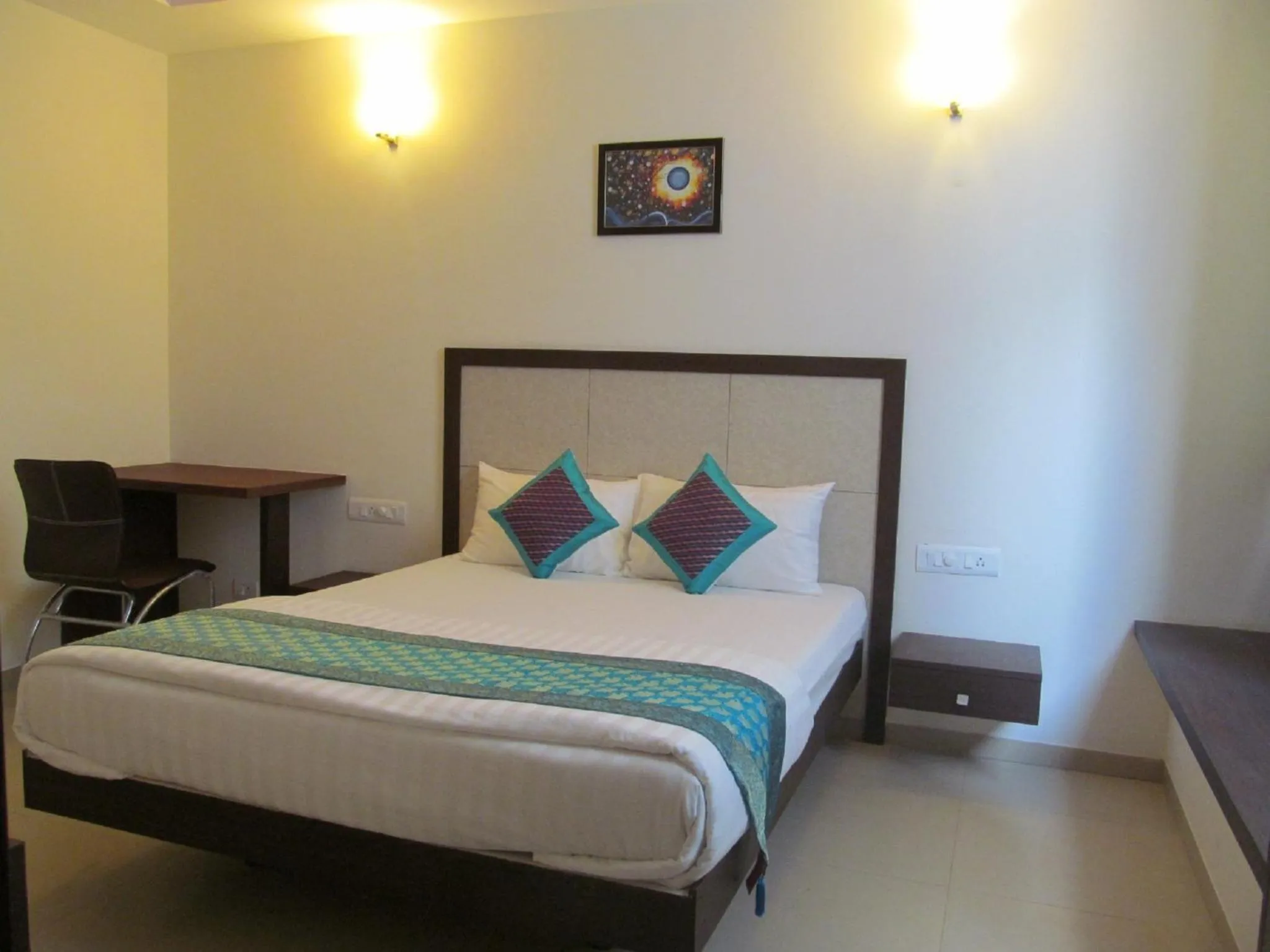 Bed in Ixora Suites