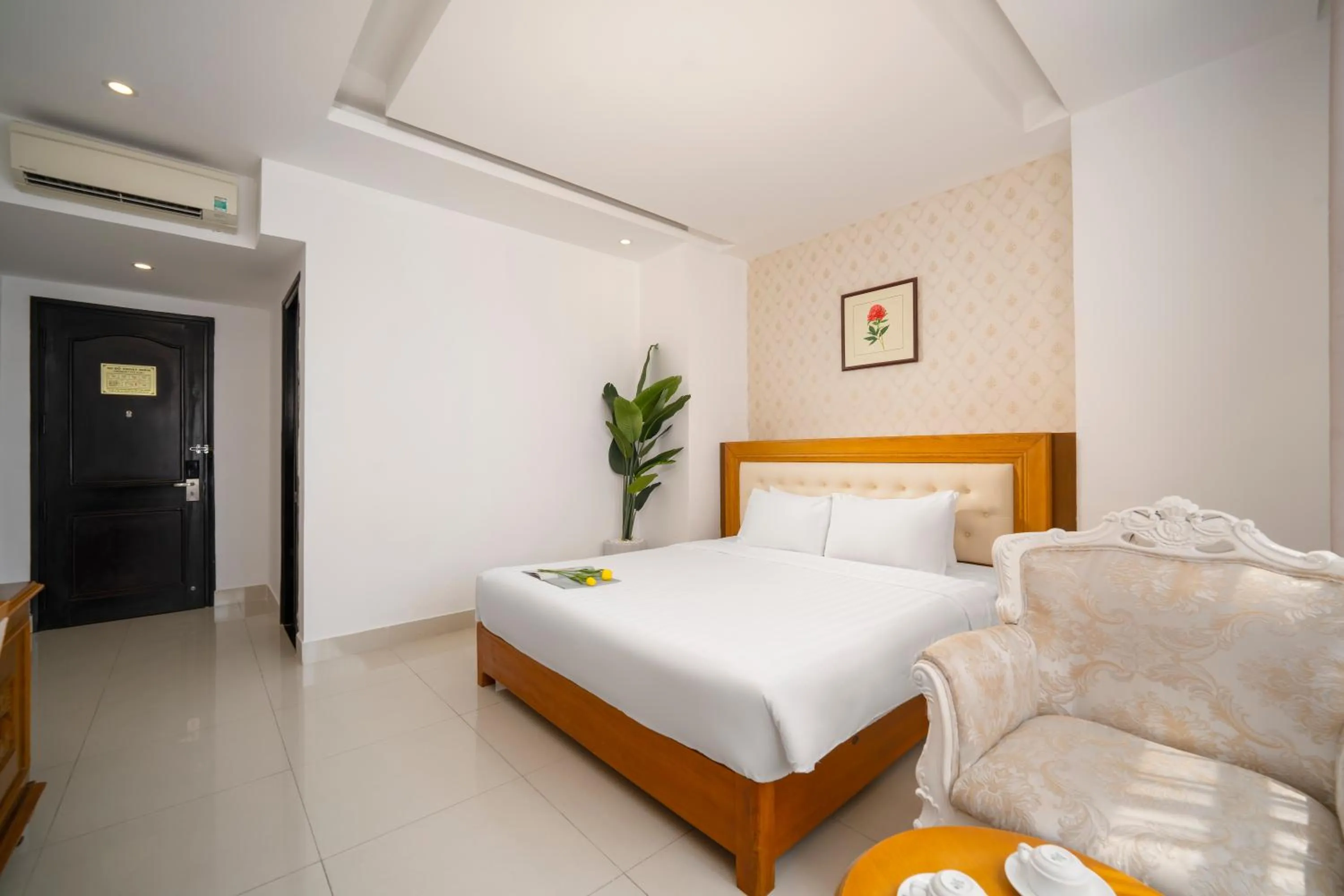 Bed in Royal Family Hotel