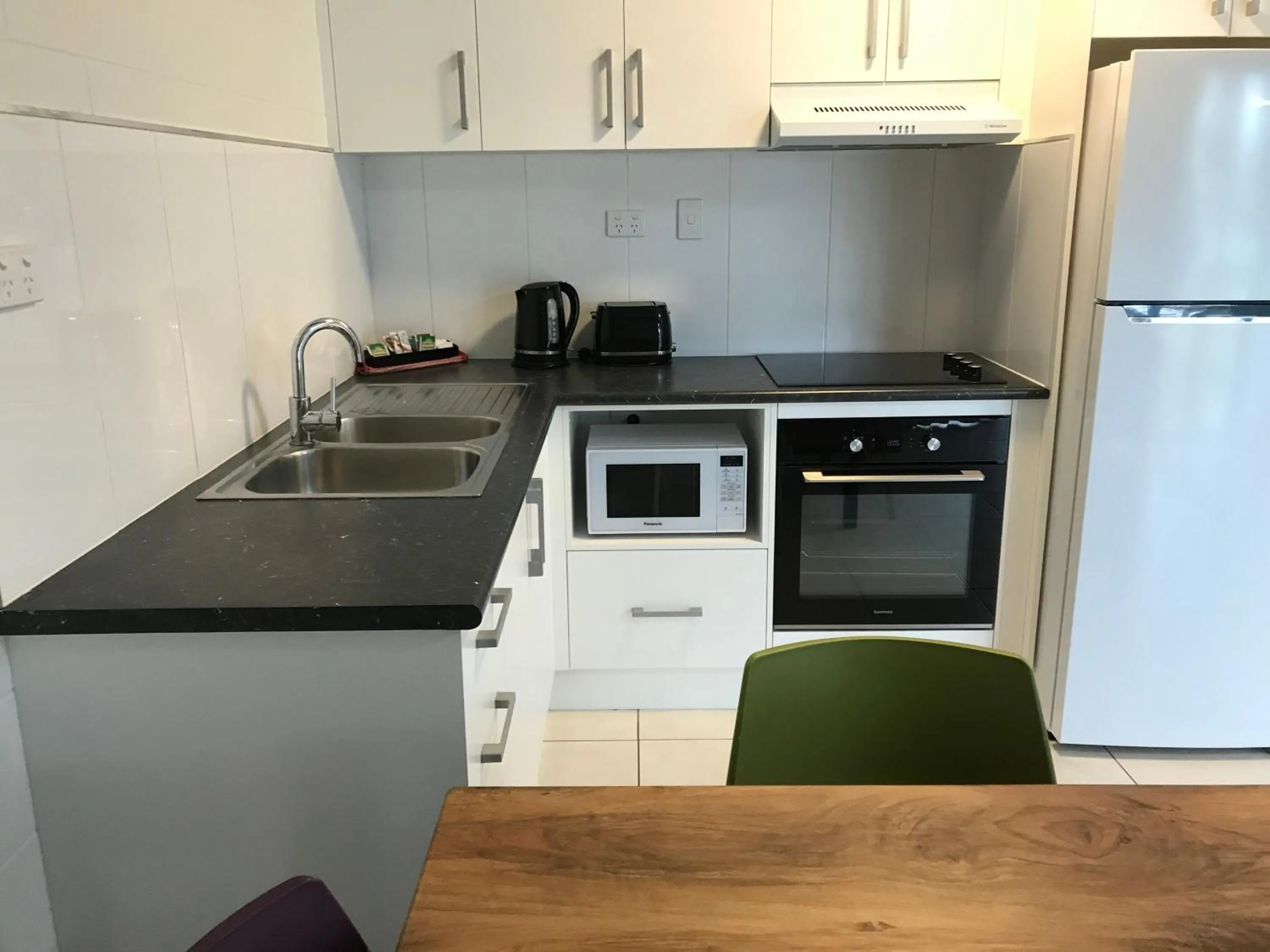 Kitchen or kitchenette in Ocean Breeze Units