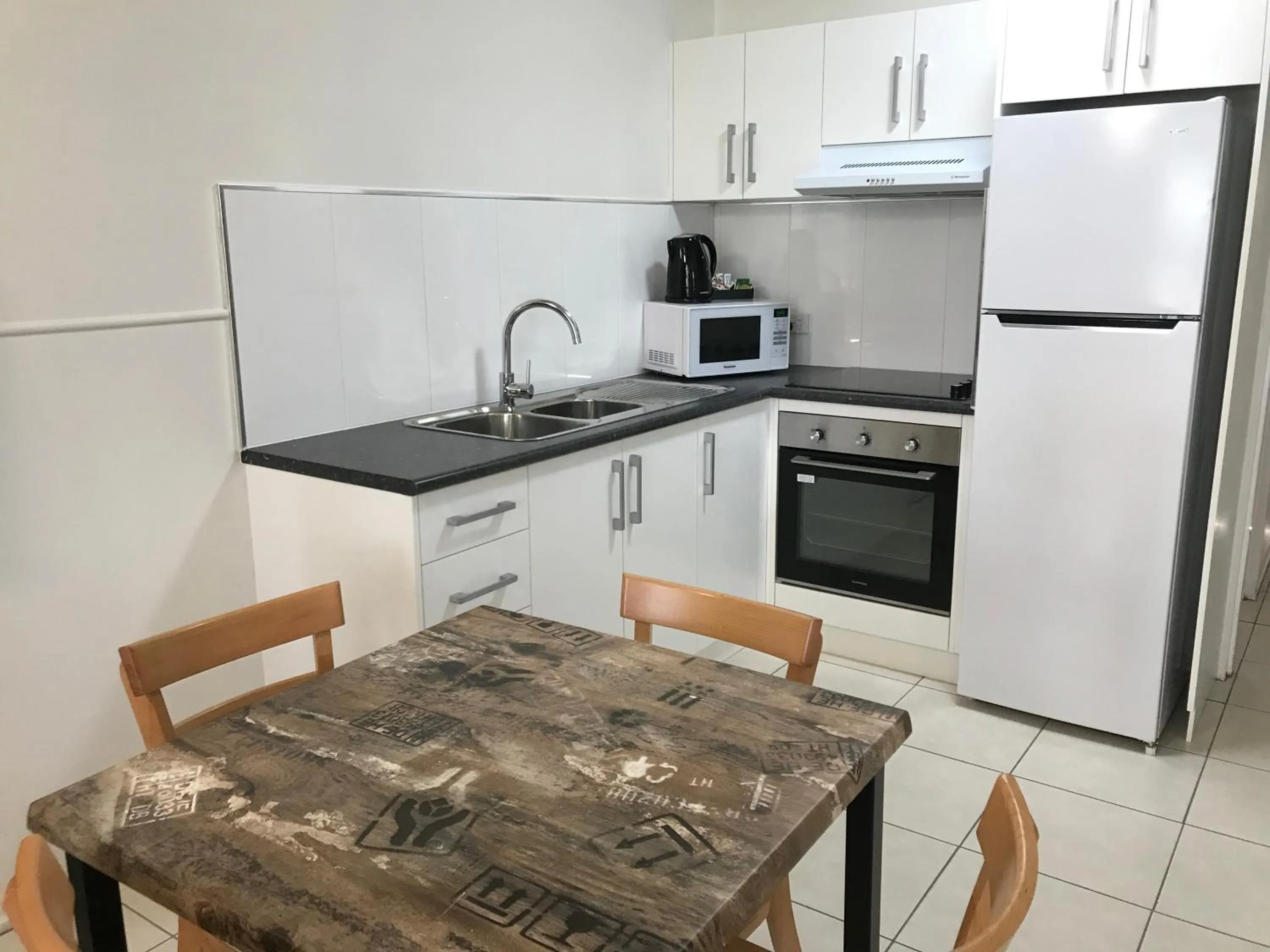 Kitchen or kitchenette in Ocean Breeze Units