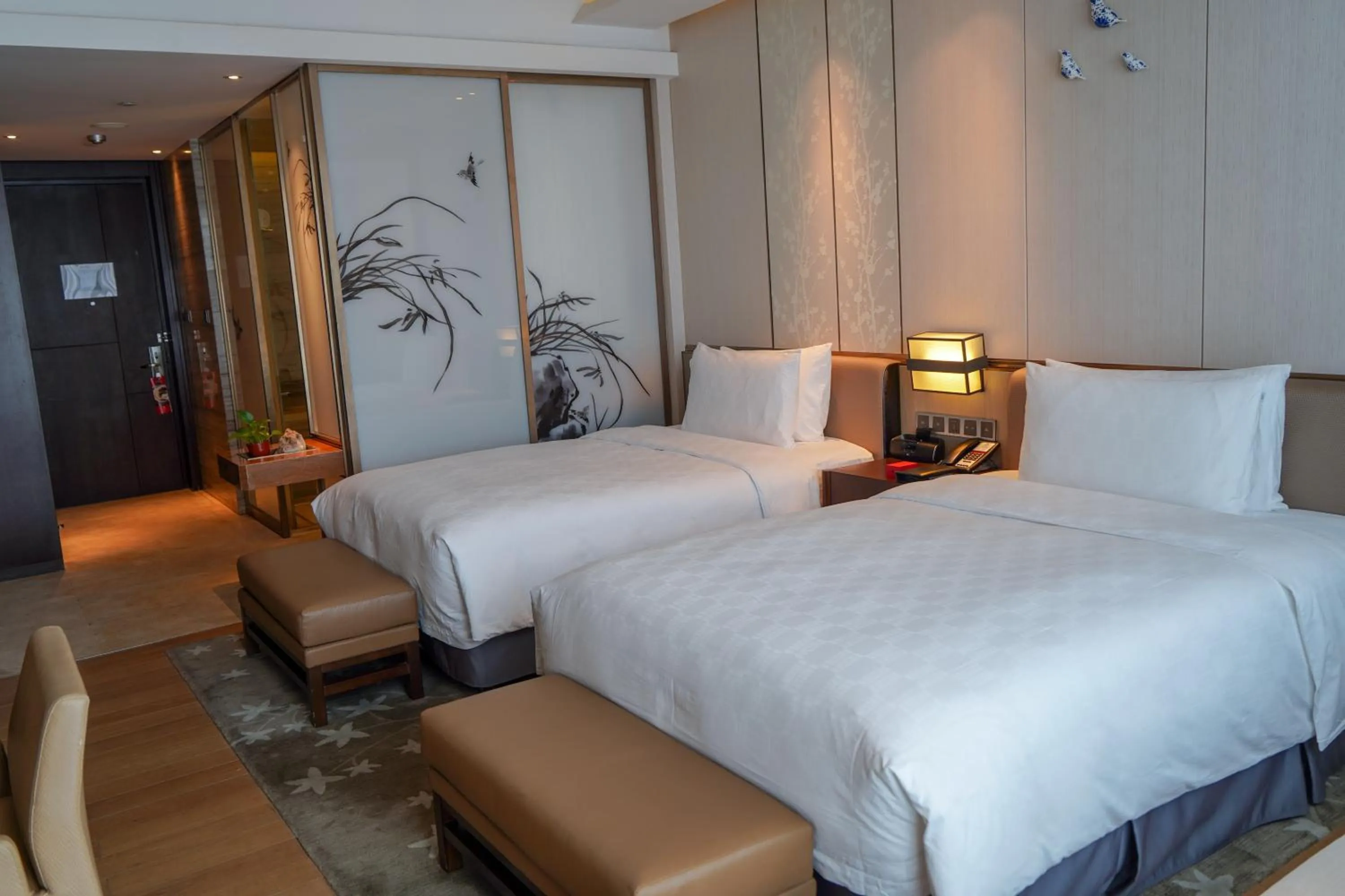 Bed in HUALUXE Hotels & Resorts Nanchang High-Tech Zone, an IHG Hotel
