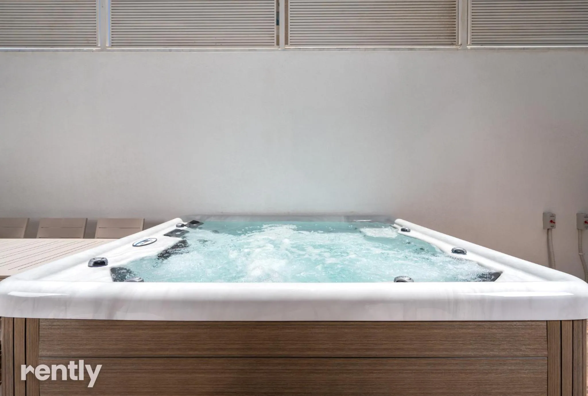 Hot Tub in Luxury Suites With Balcony And Jacuzzi At Sea Side By Rently