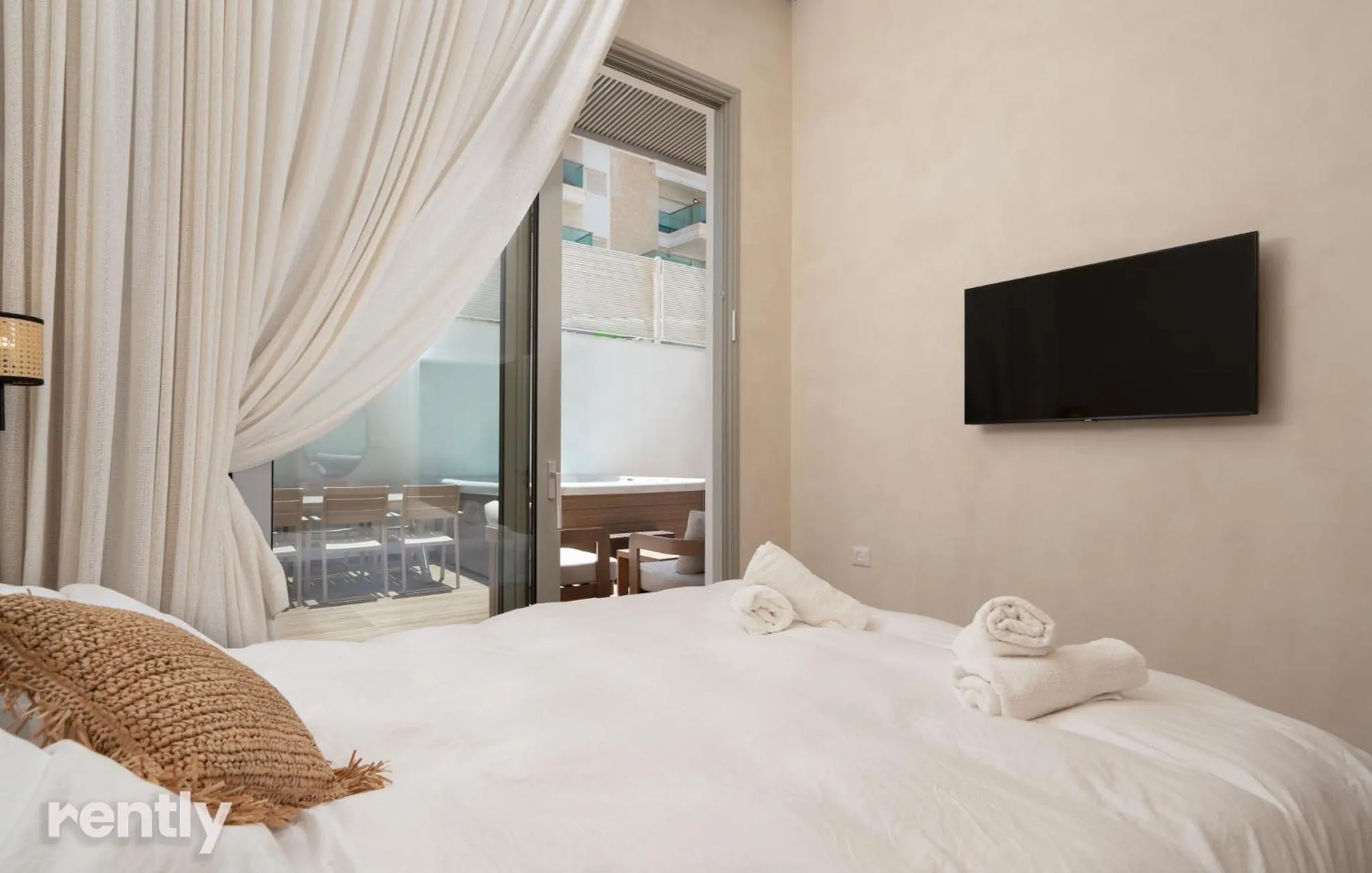 Bed in Luxury Suites With Balcony And Jacuzzi At Sea Side By Rently