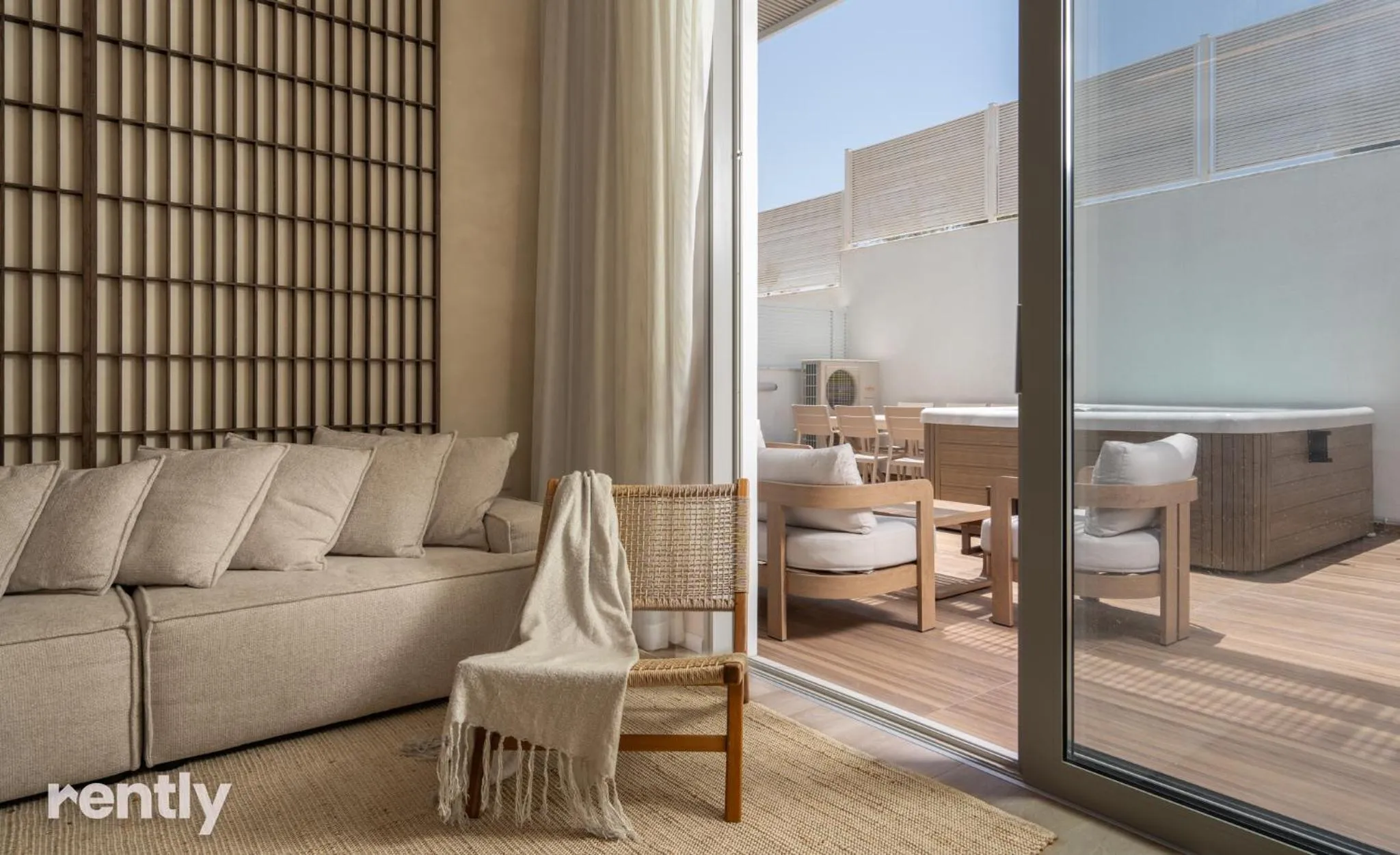 Living room in Luxury Suites With Balcony And Jacuzzi At Sea Side By Rently