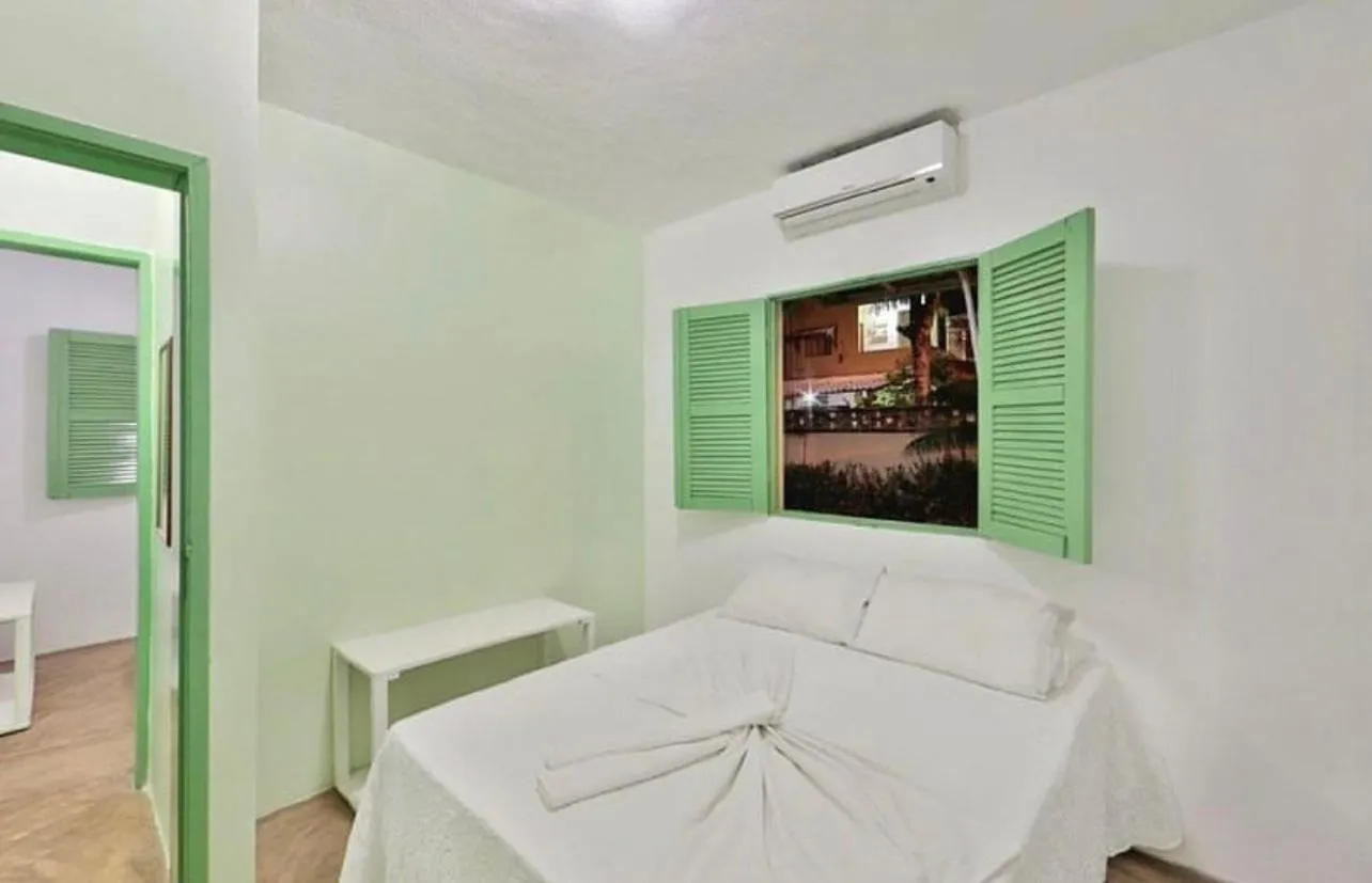 Bed in Pousada Maracaju