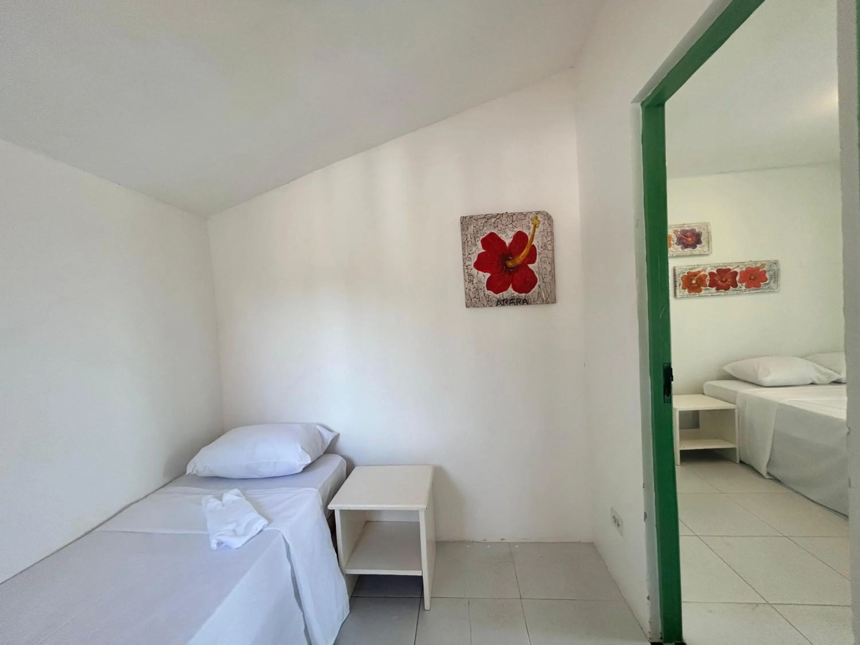 Bed in Pousada Maracaju