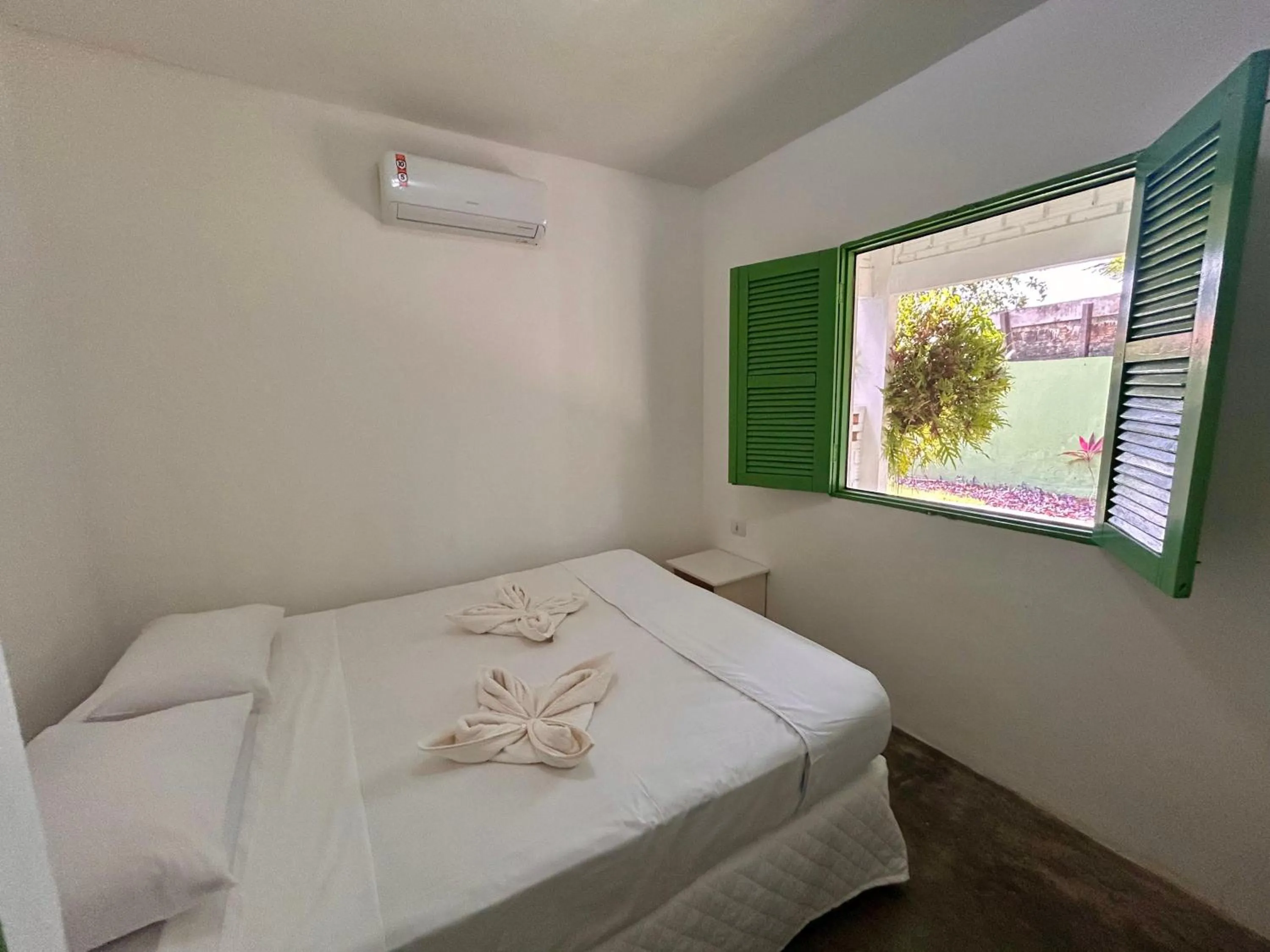 Bed in Pousada Maracaju