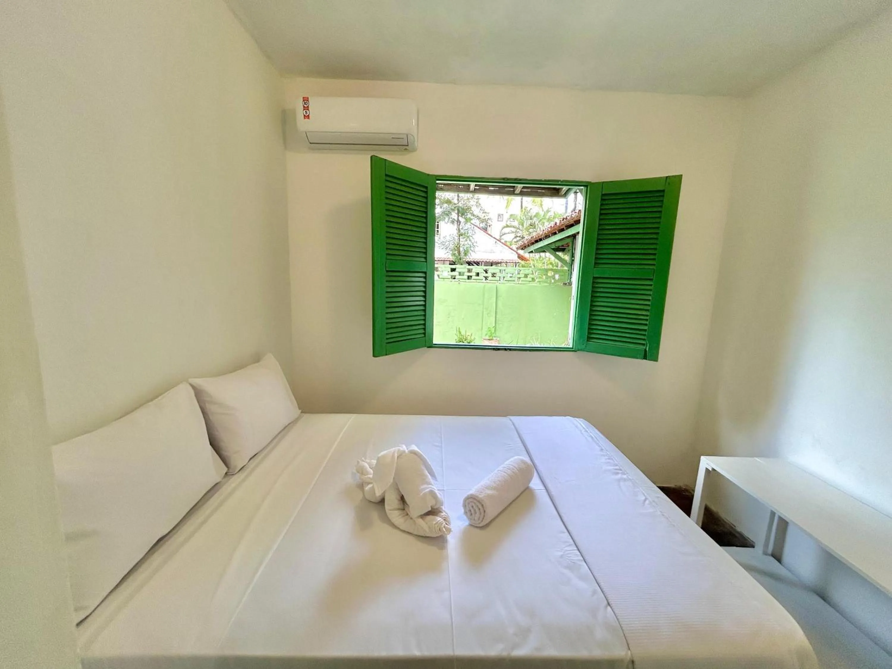 Bed in Pousada Maracaju