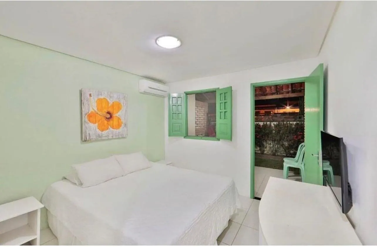 Bed in Pousada Maracaju