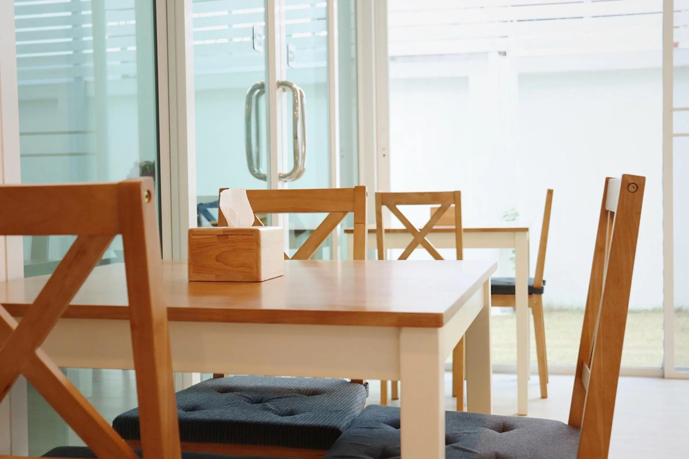 Dining area in ResT Bangkok Poshtel