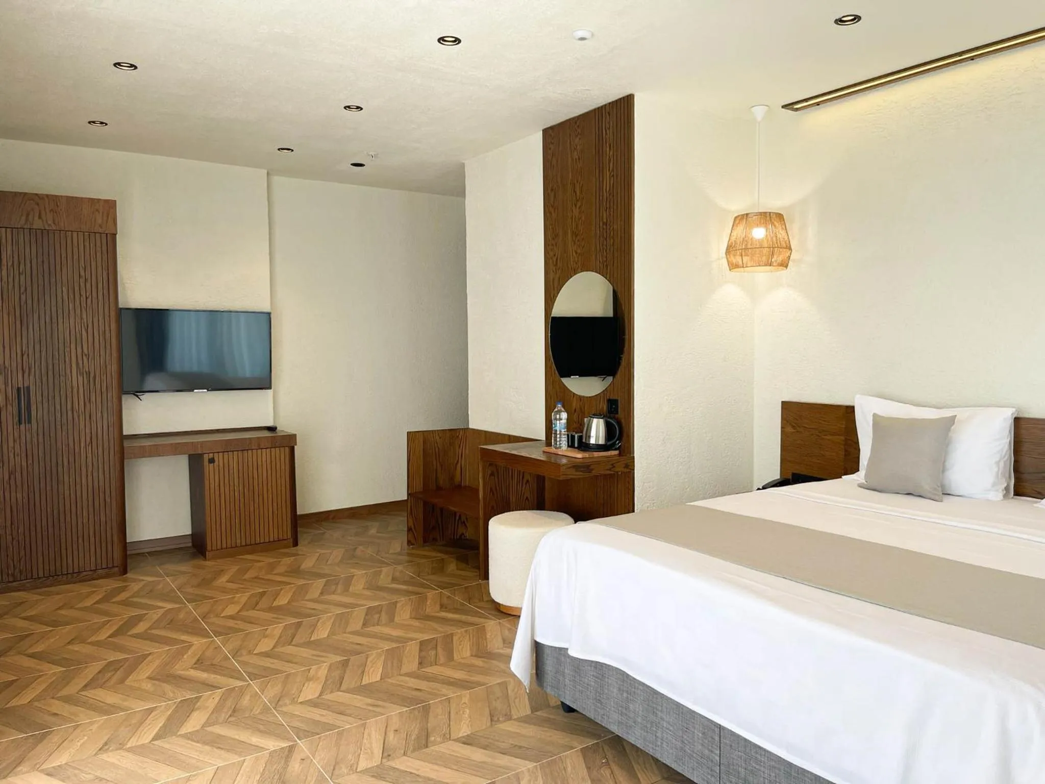 Bed in Now Boutique Hotel