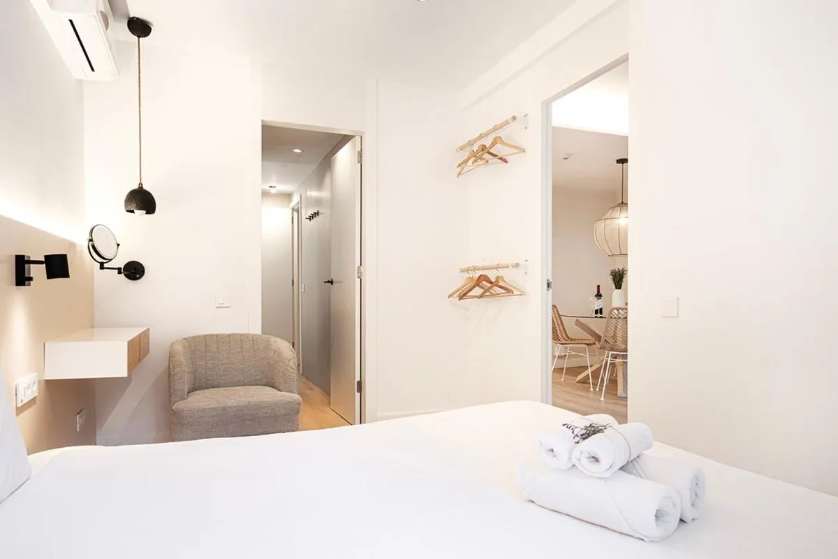 Bed in Happy Apartments