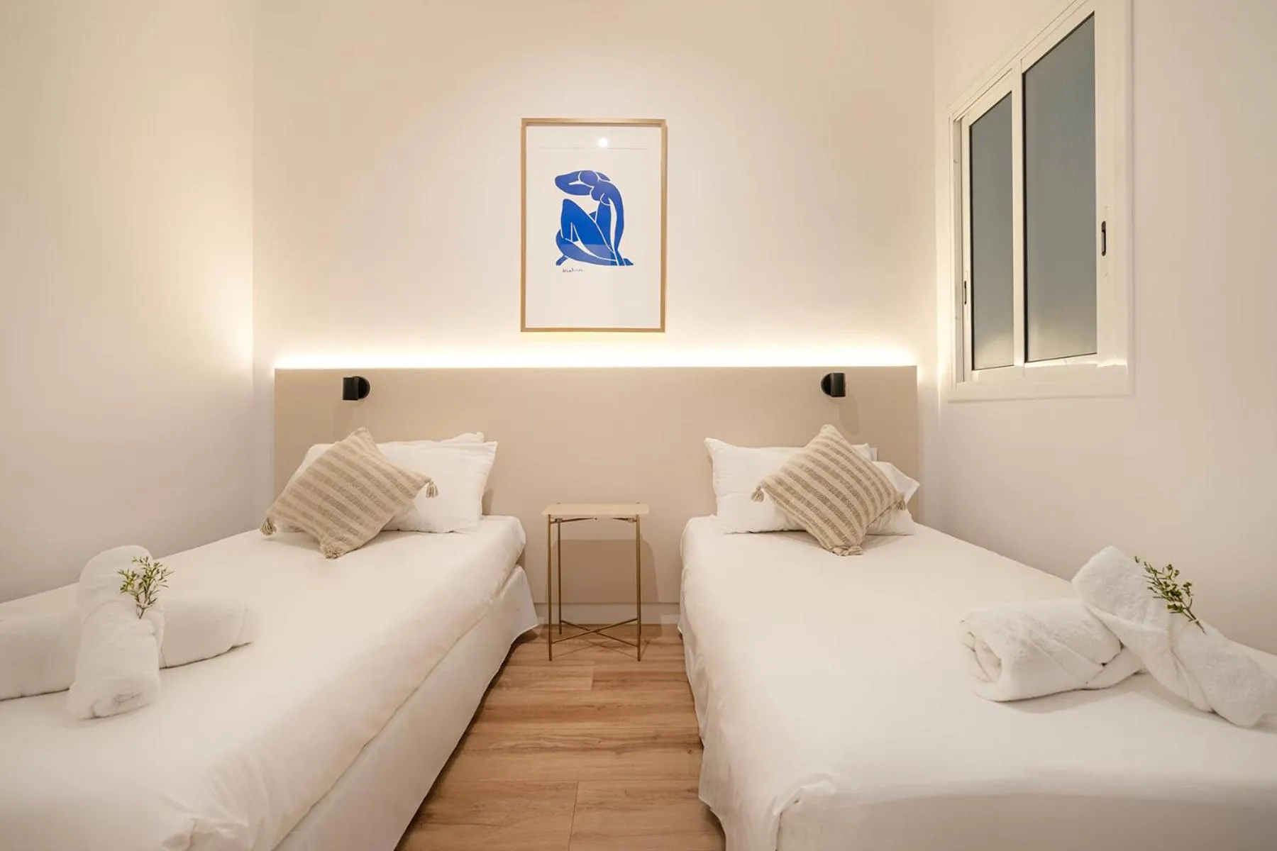 Bed in Happy Apartments