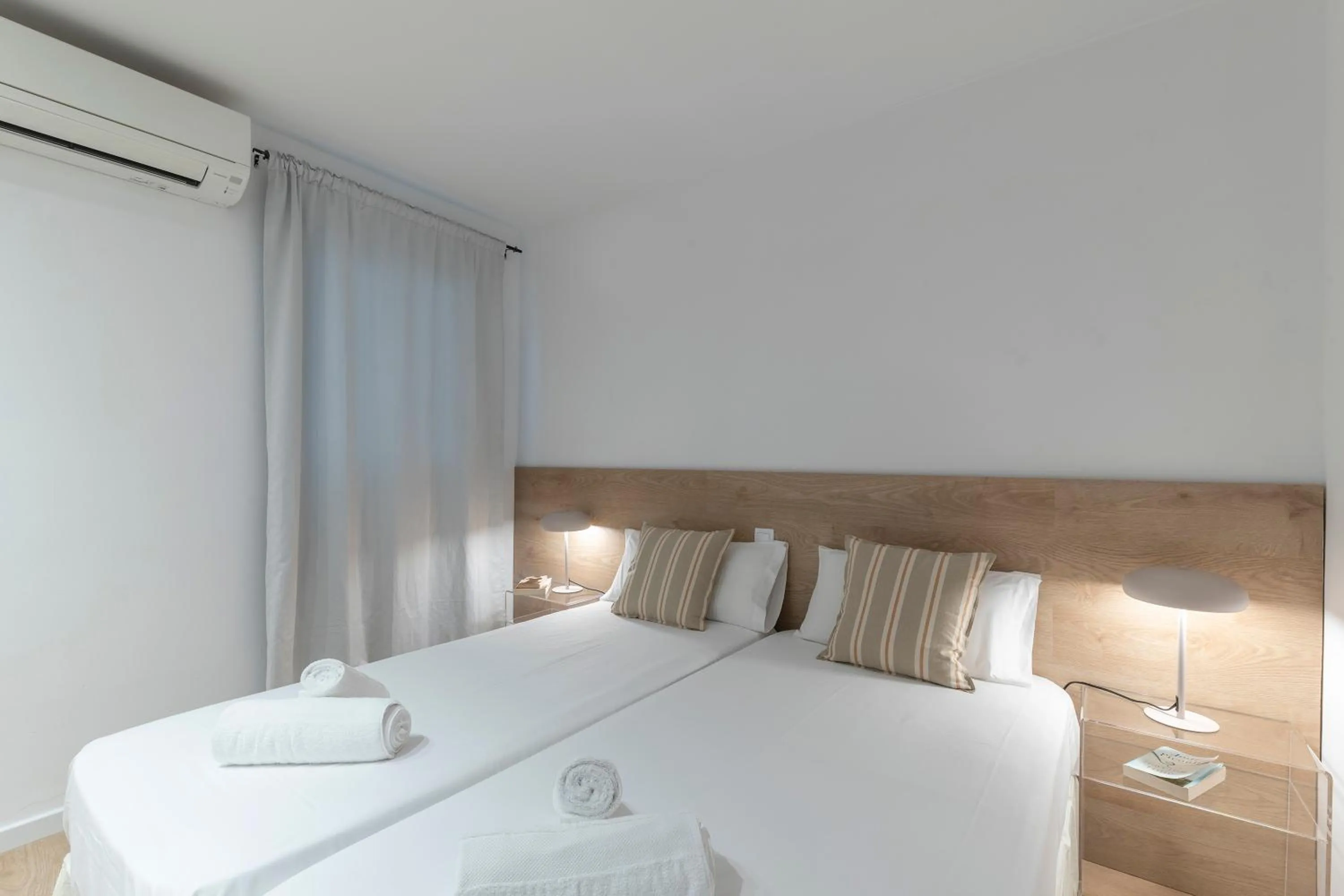 Bed in Happy Apartments