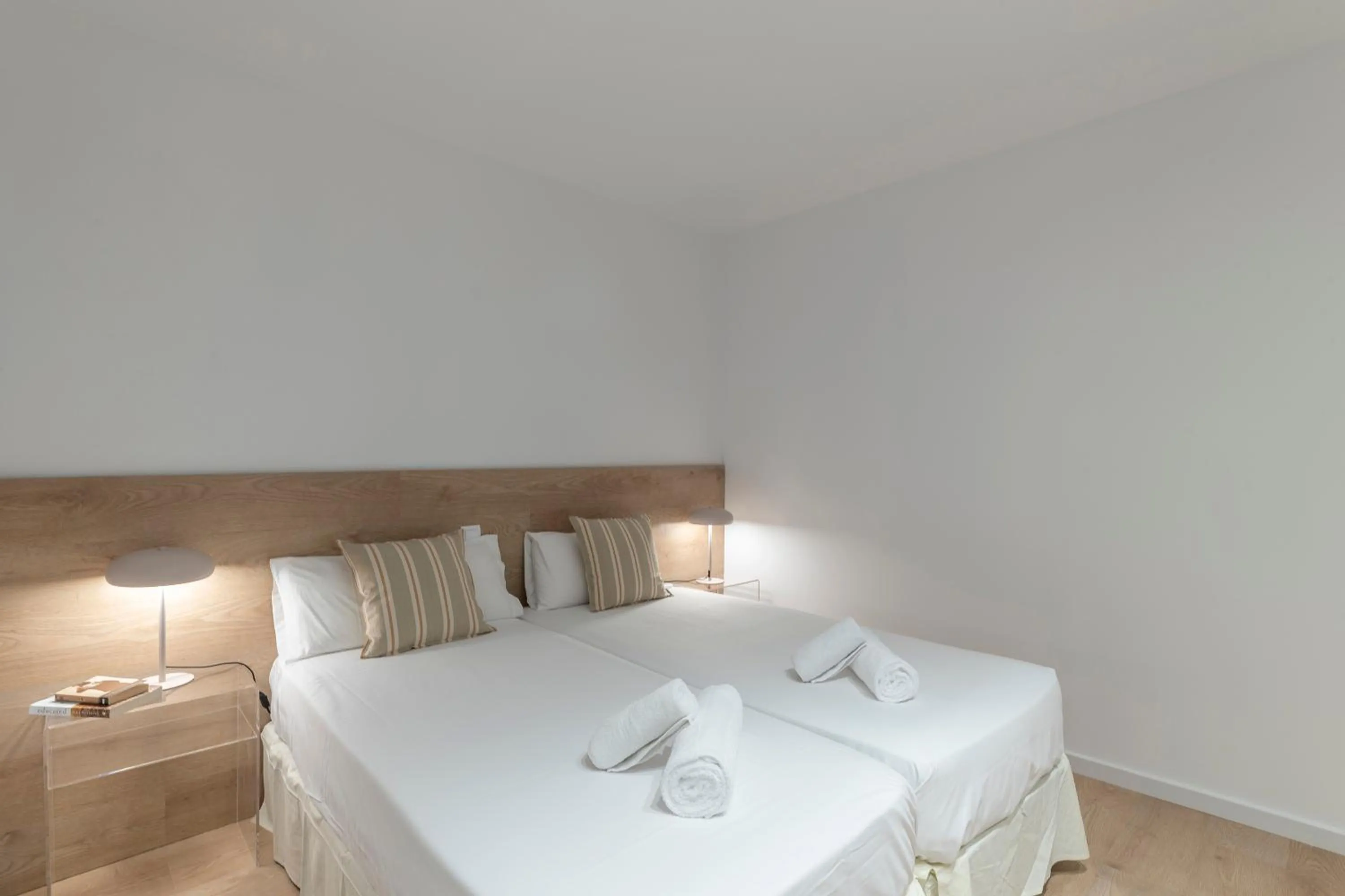 Bed in Happy Apartments