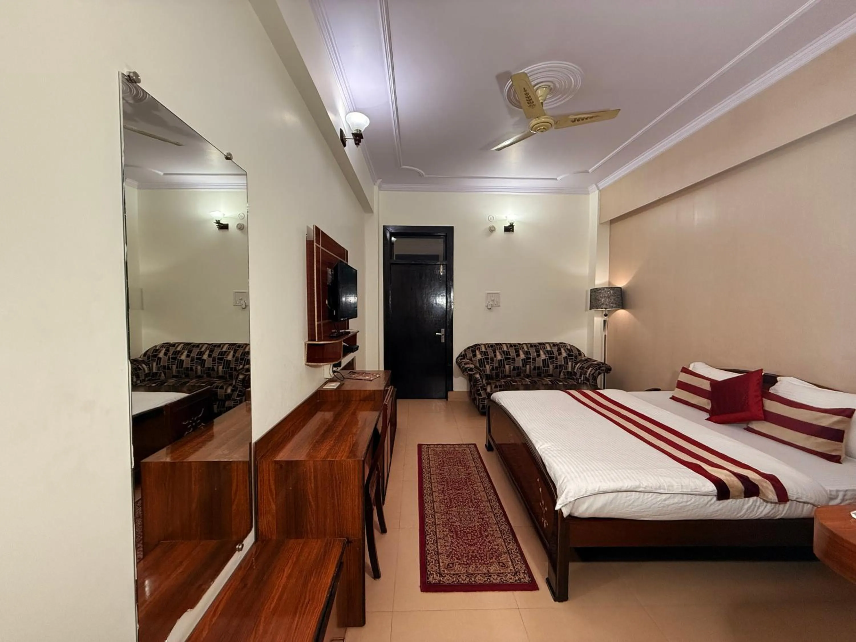 Bed in Hotel Mandakini