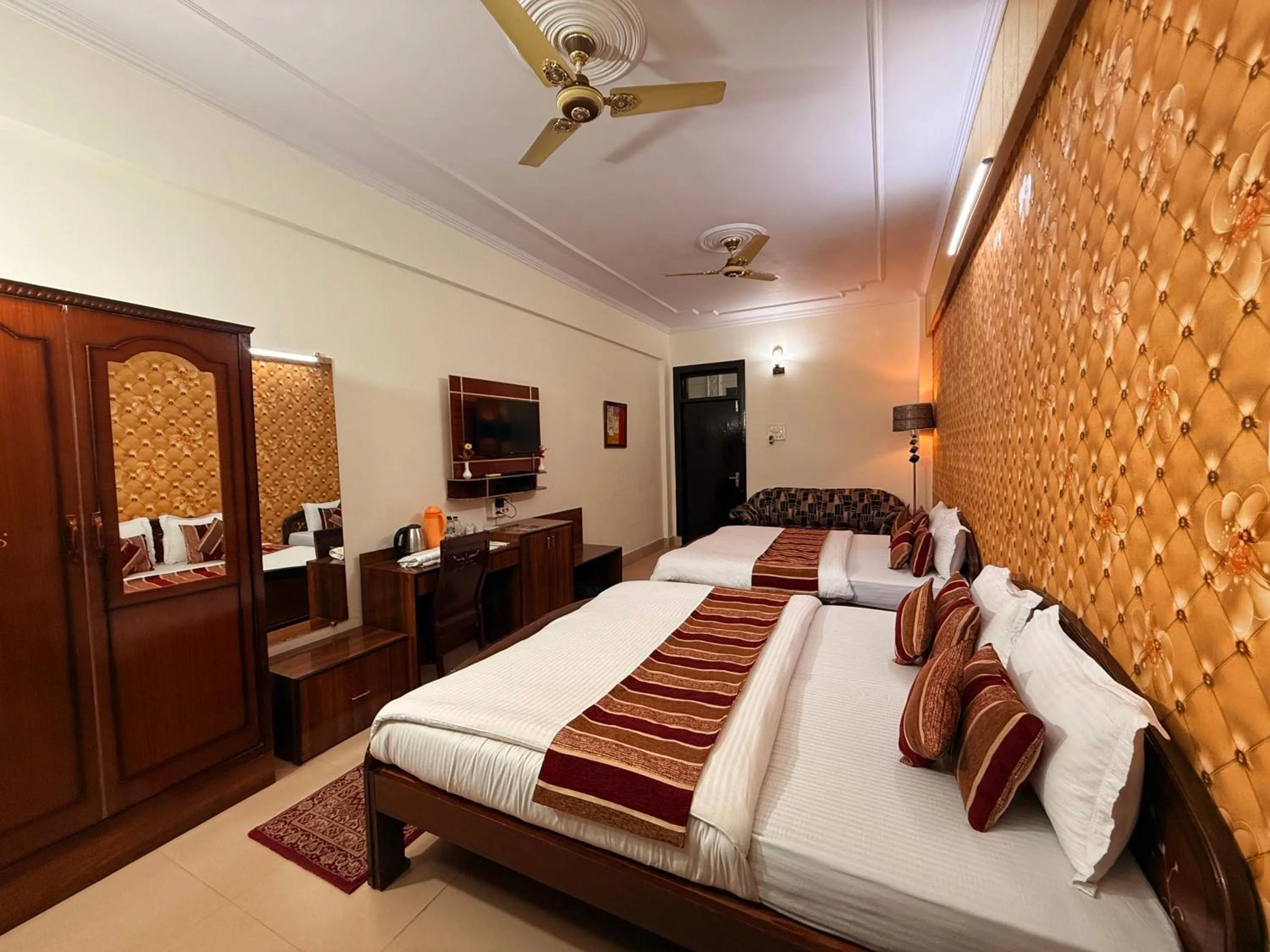 Bed in Hotel Mandakini