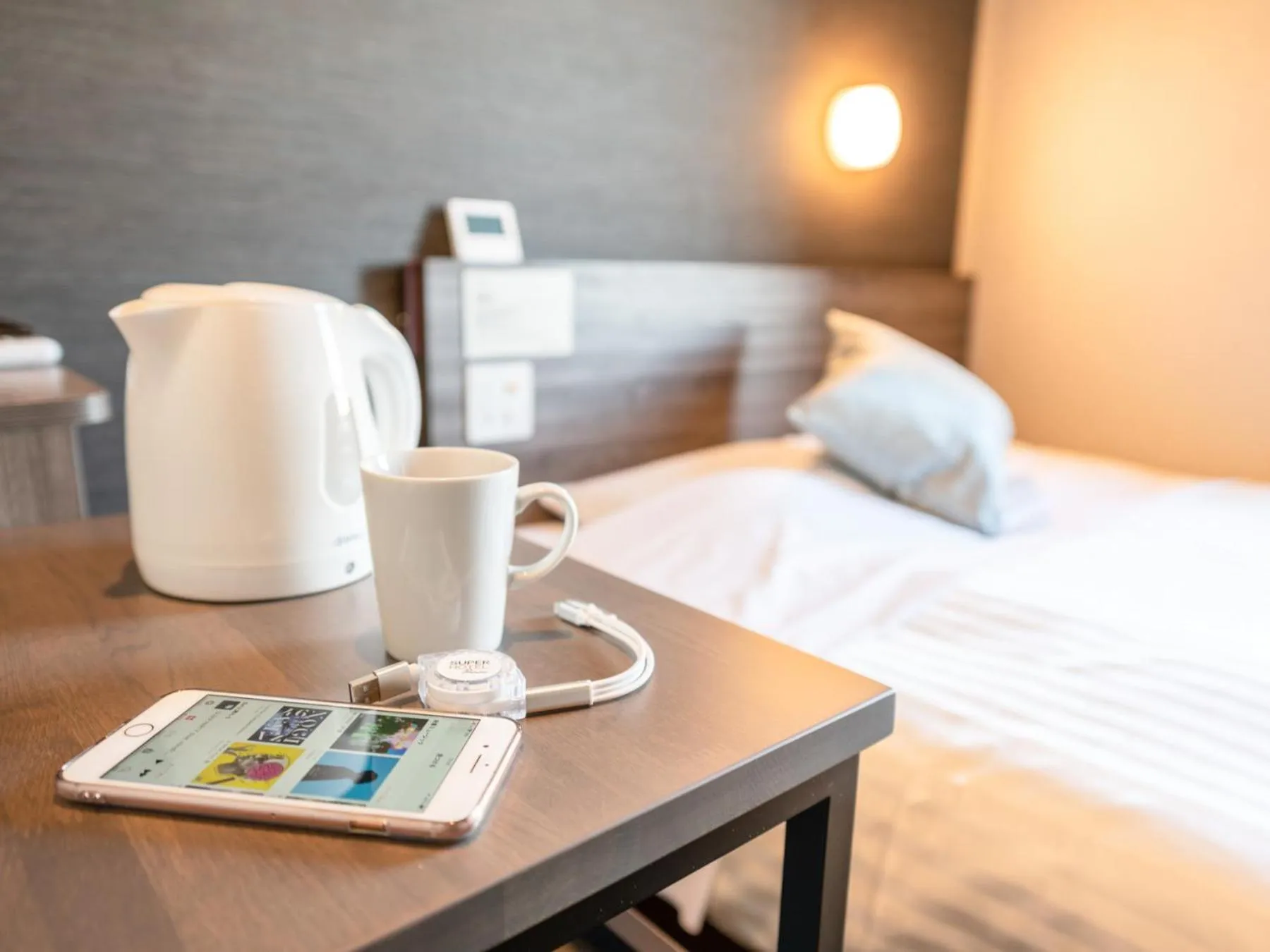 Bed in Super Hotel Premier Nagoya Sakuradoriguchi