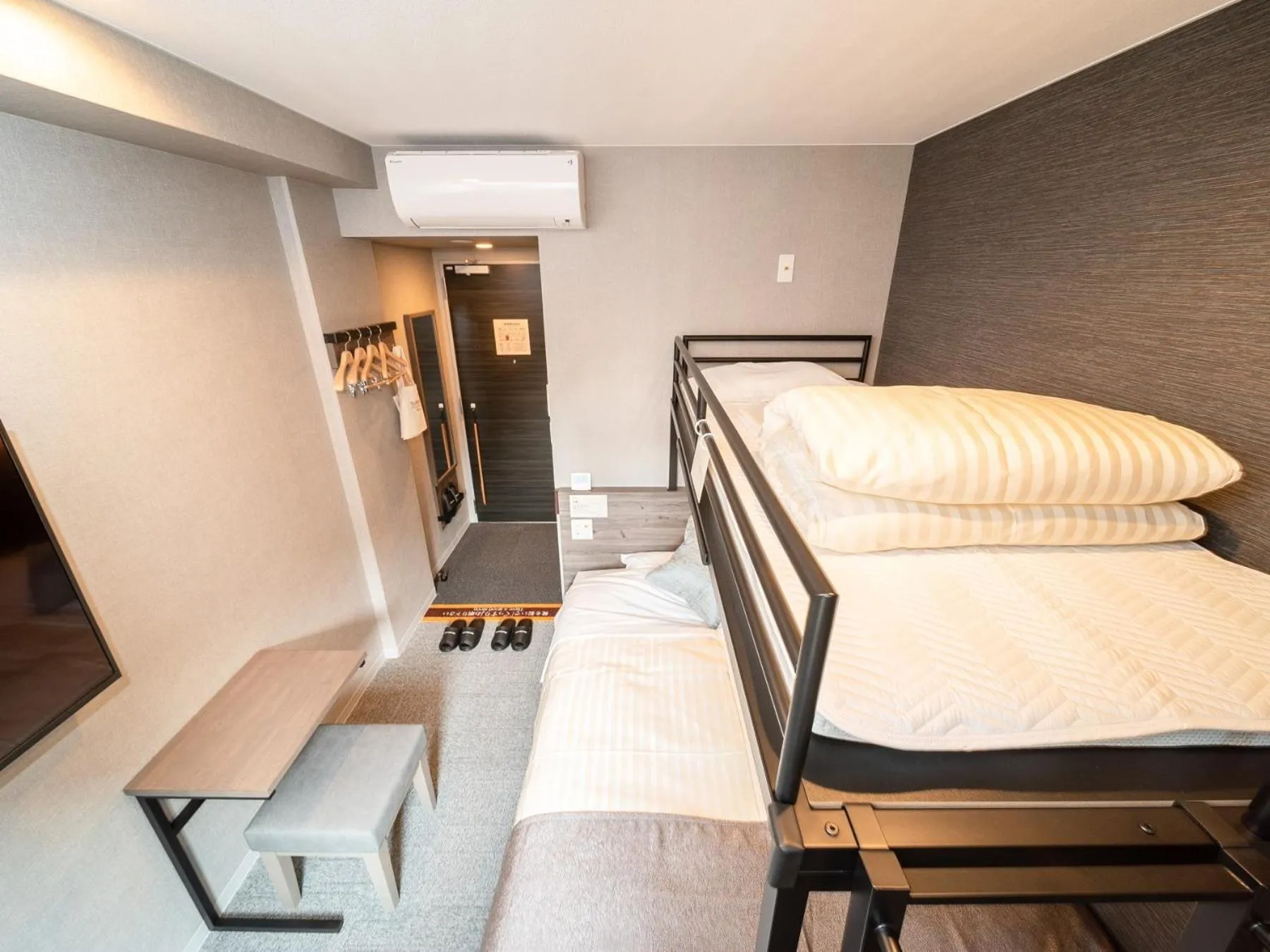 Bed in Super Hotel Premier Nagoya Sakuradoriguchi