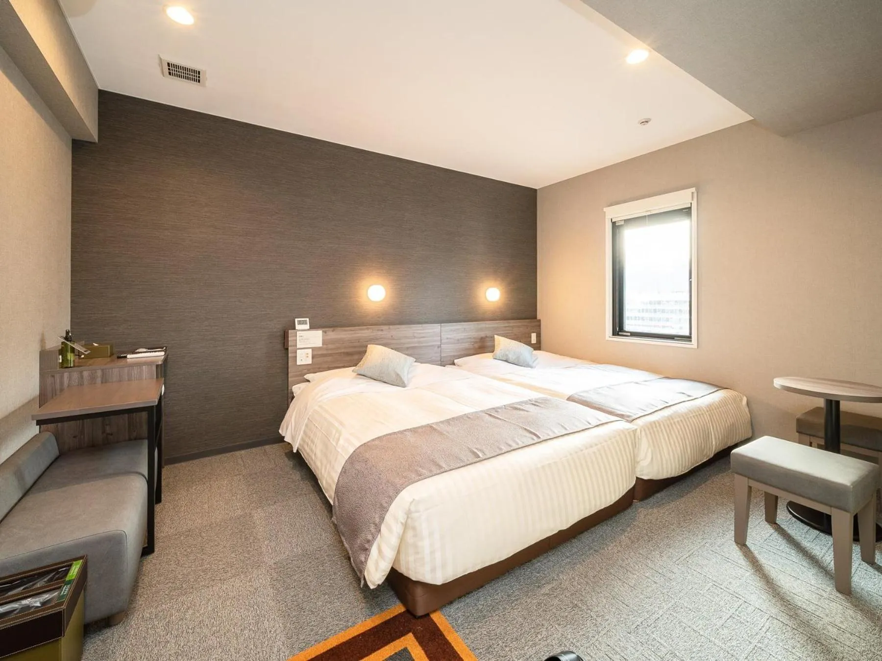 Bed in Super Hotel Premier Nagoya Sakuradoriguchi