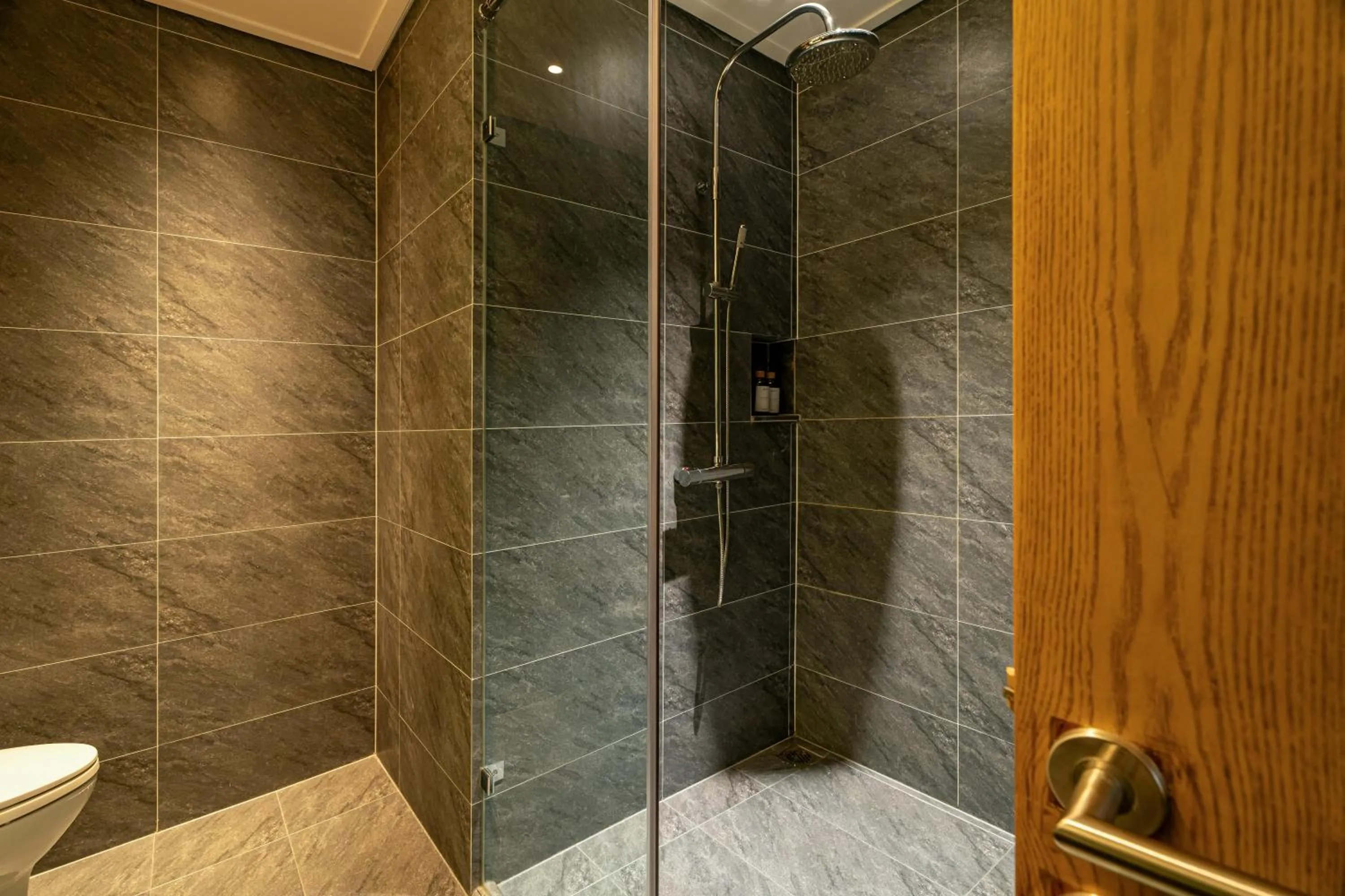 Shower in Nam Dat Hotel by D'Lecia Ha Long