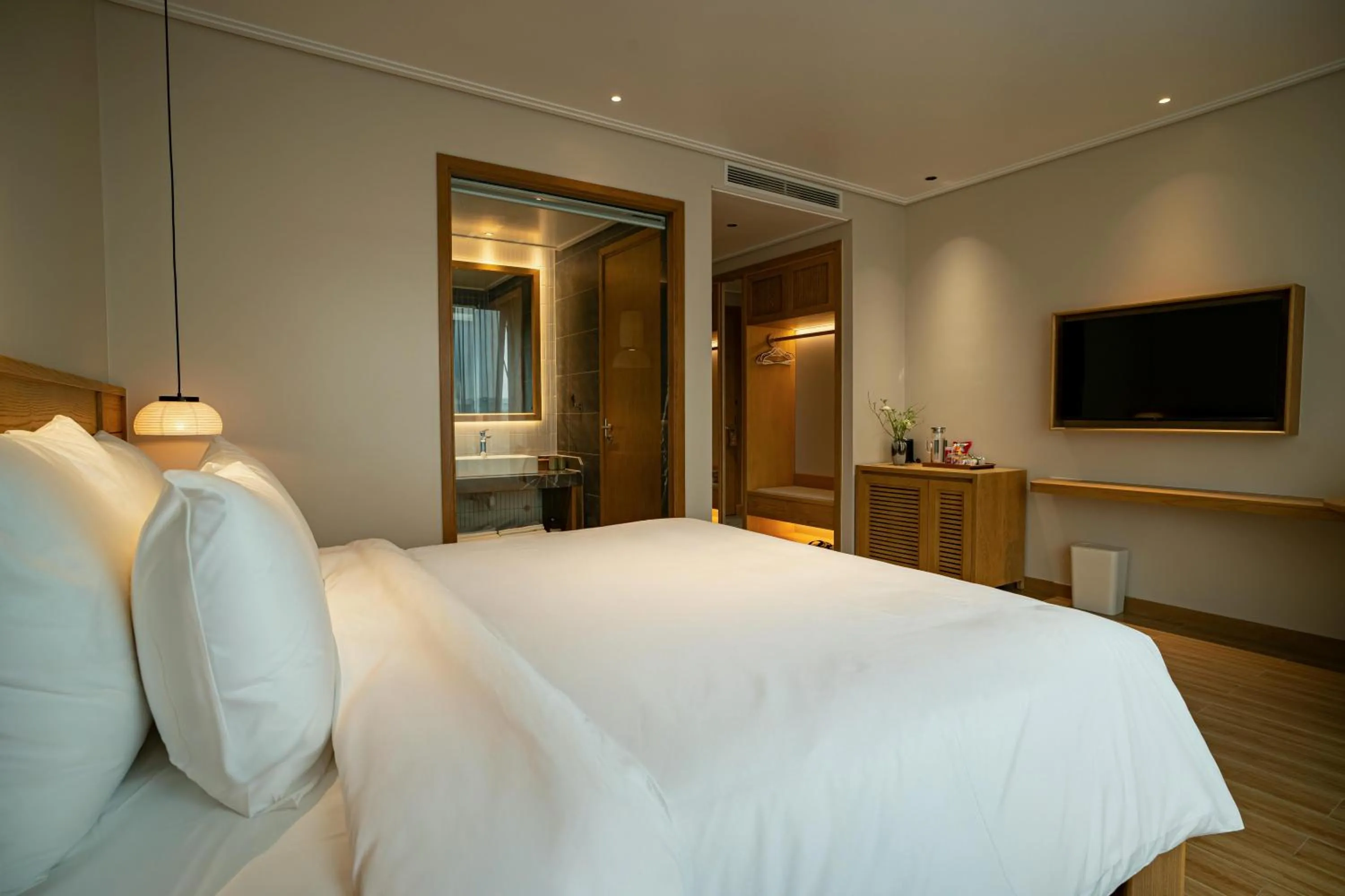 Bed in Nam Dat Hotel by D'Lecia Ha Long