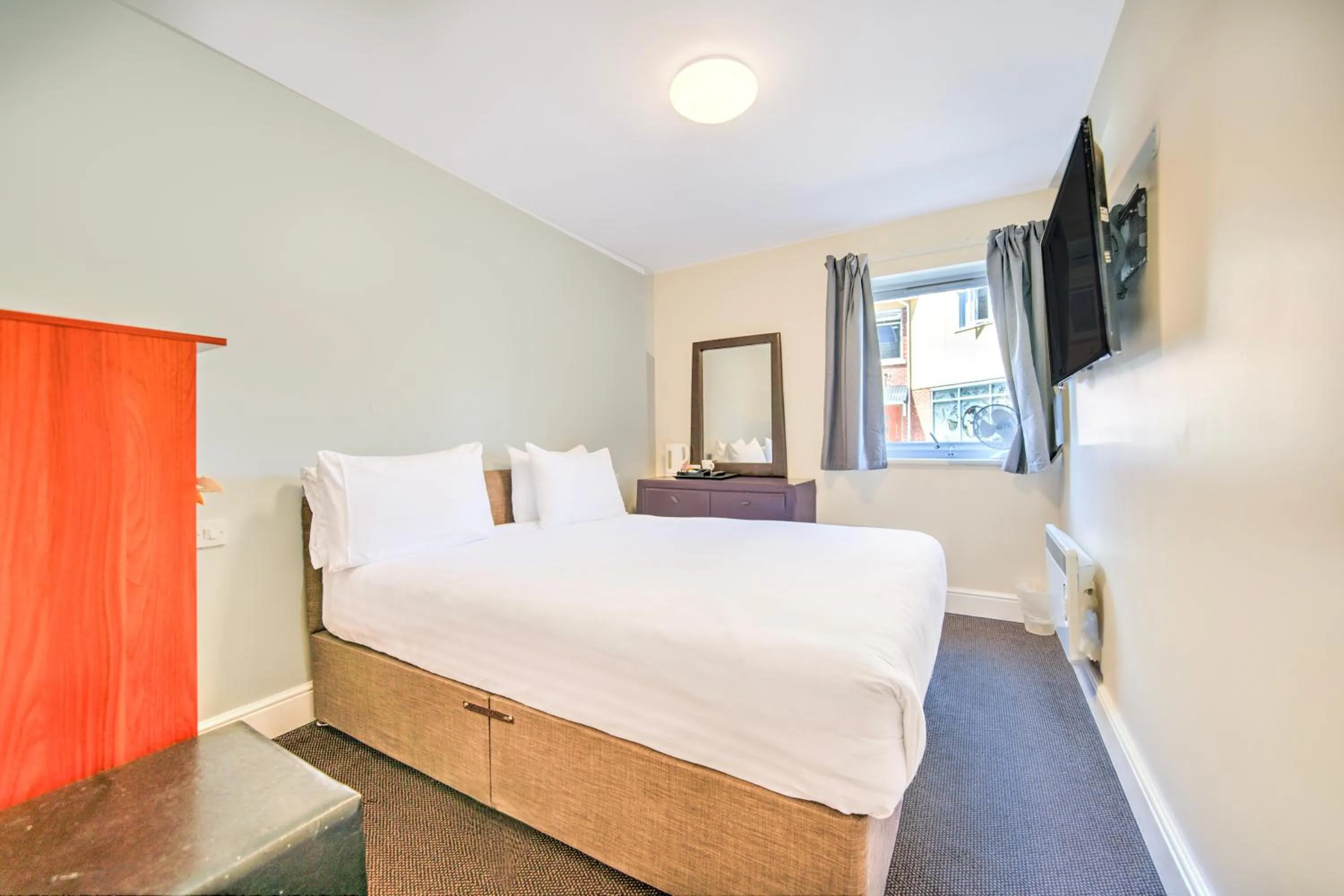 Photo of the whole room, Bed in GO2 Gloucester Hotel by OYO