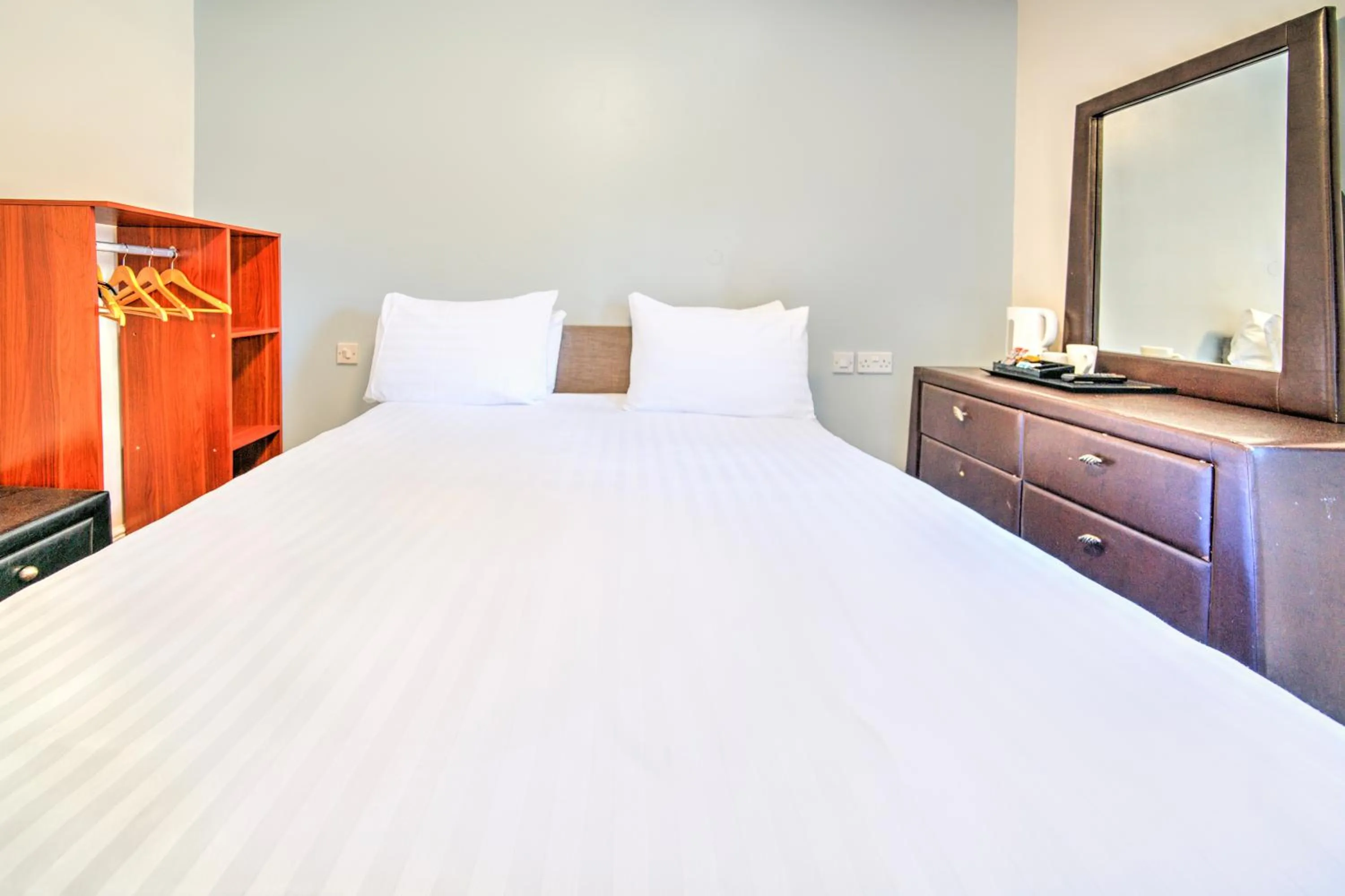 Bedroom, Bed in GO2 Gloucester Hotel by OYO