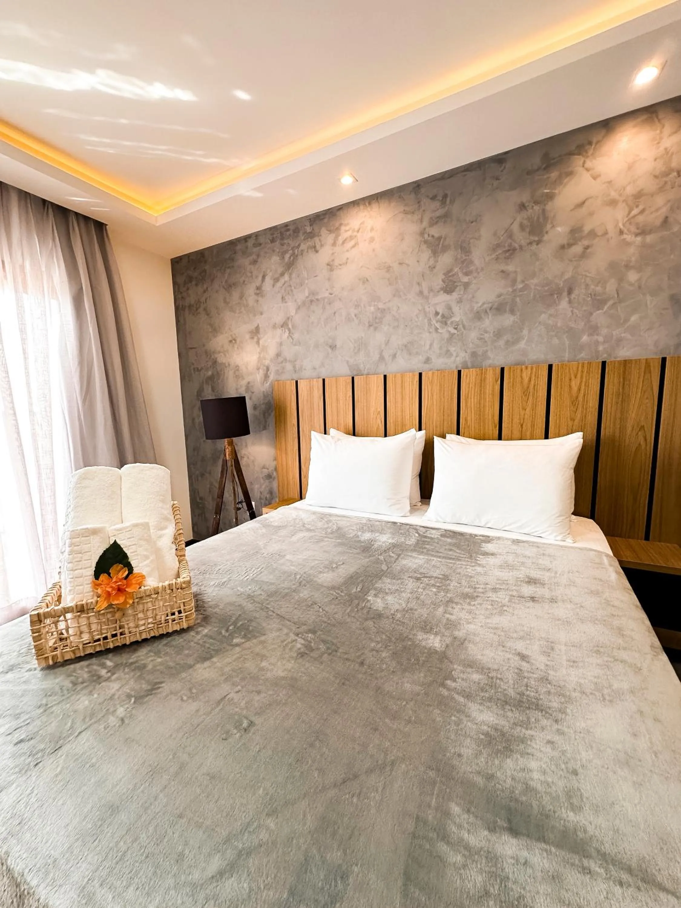 Bed in Aloha Palace Hotel