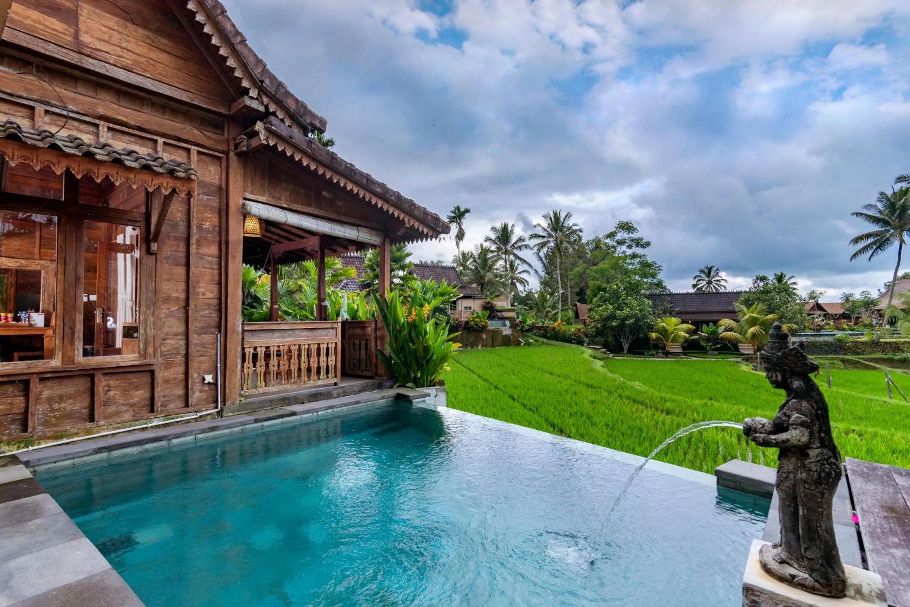 Pool view in Taksu Sebatu Villa by Dhananjaya Hospitality