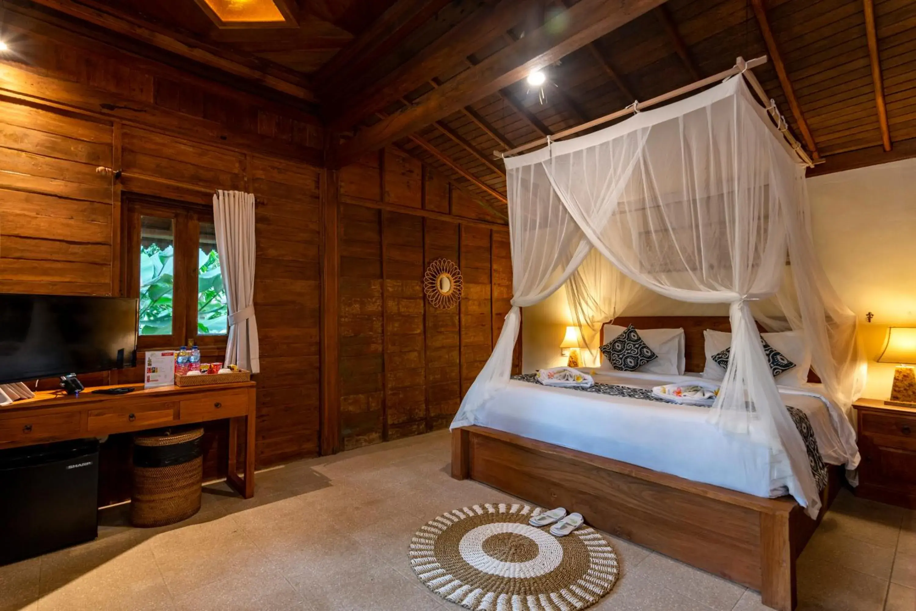 Bed in Taksu Sebatu Villa by Dhananjaya Hospitality Bed in Taksu Sebatu Villa by Dhananjaya Hospitality