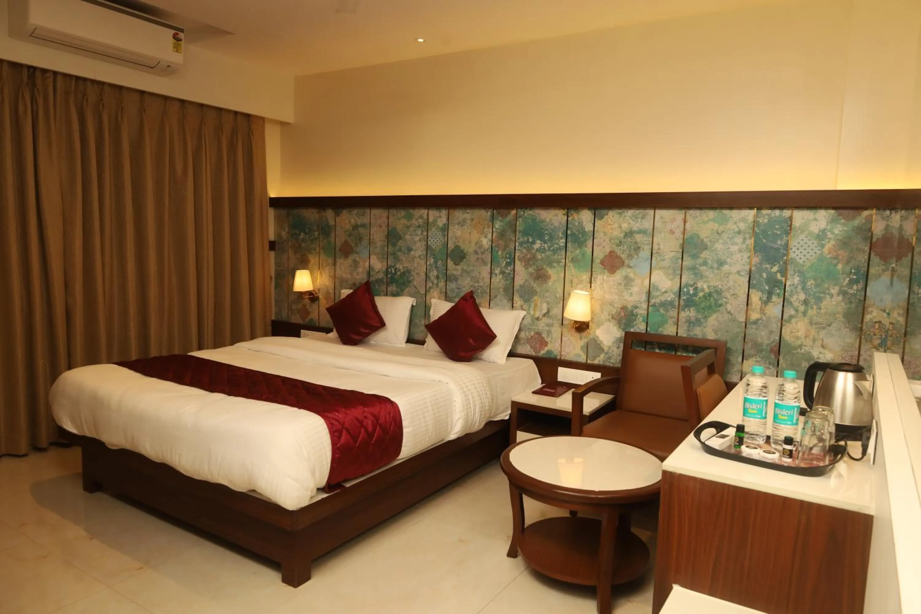 Bed in Hotel Prestige Residency