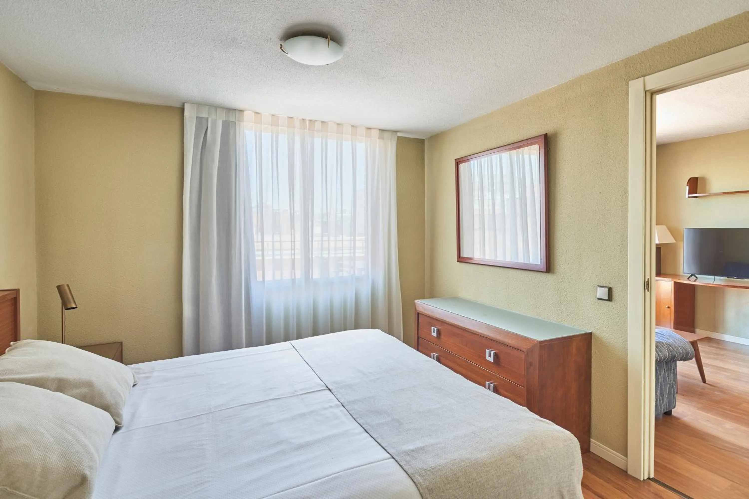 Bed in Apartamentos Juan Bravo