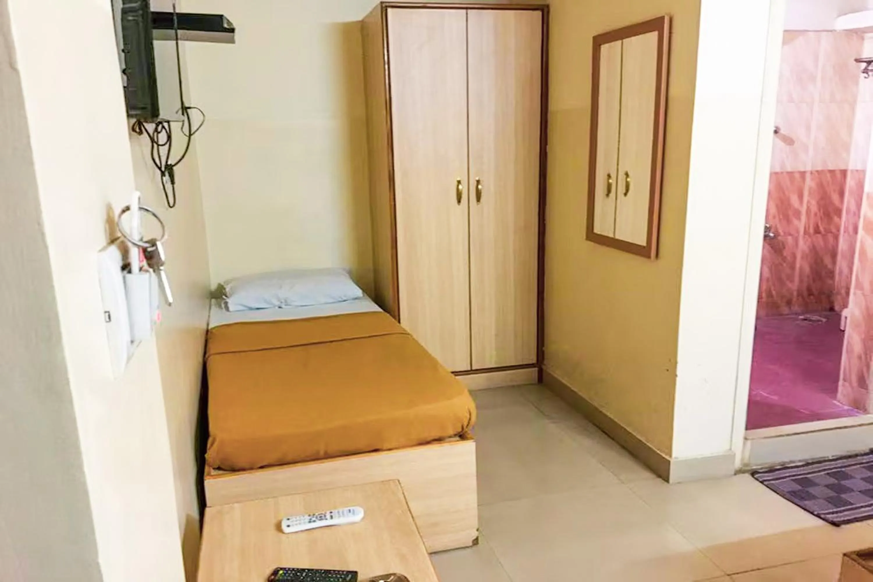 Bedroom, Bed in Hotel Rainbow near Victoria Hospital City Market