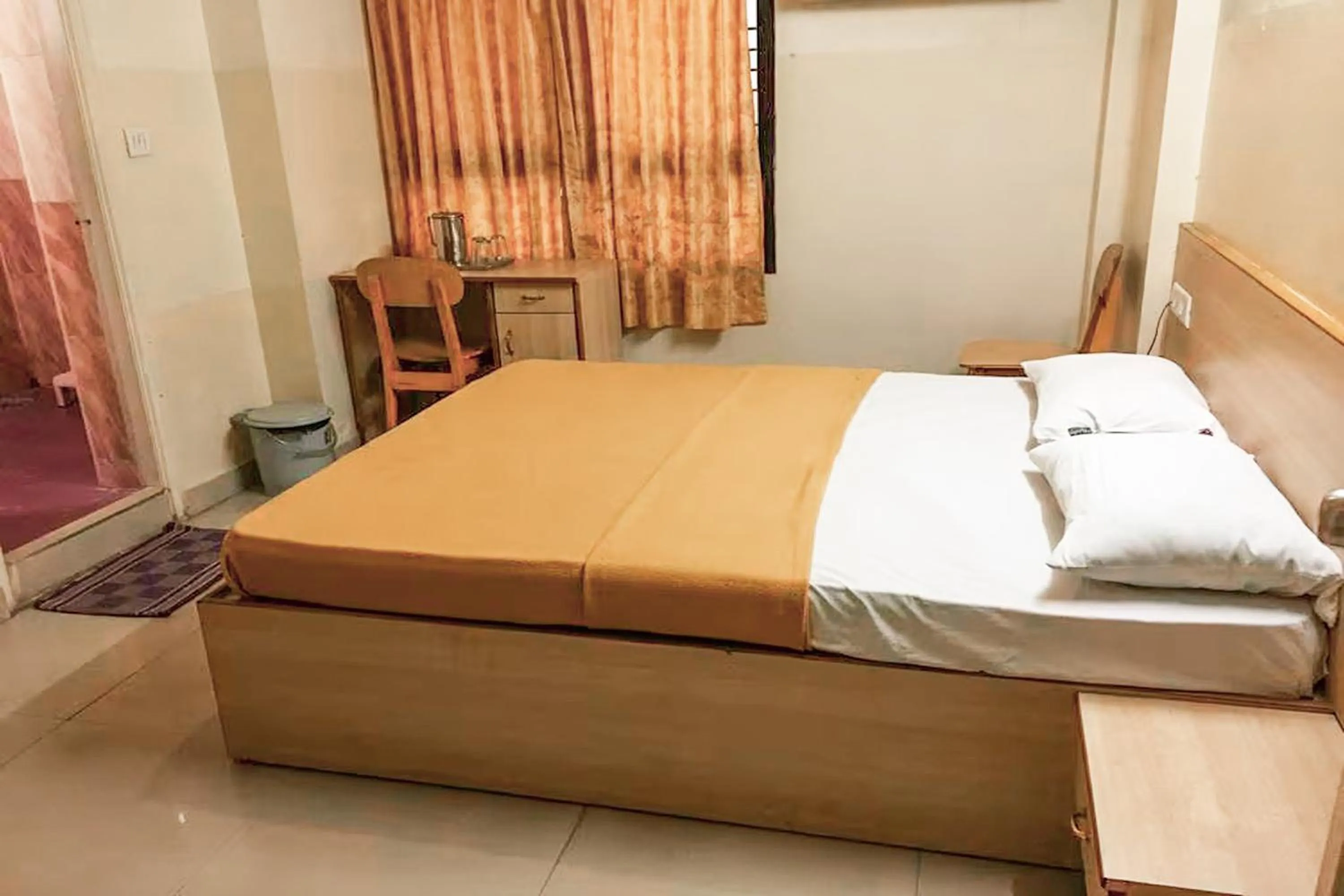 Bedroom, Bed in Hotel Rainbow near Victoria Hospital City Market