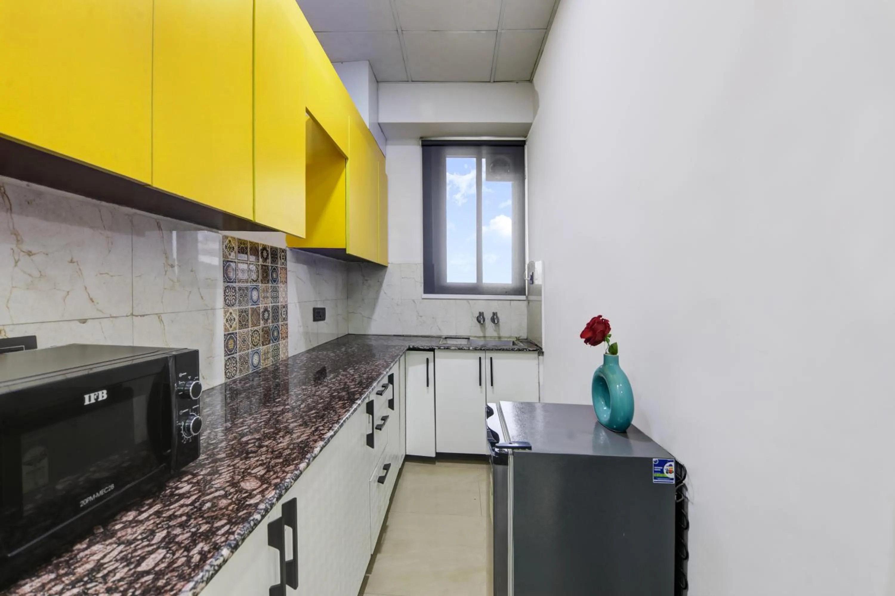 Kitchen or kitchenette in Hotel The Rasa at Vasundhara