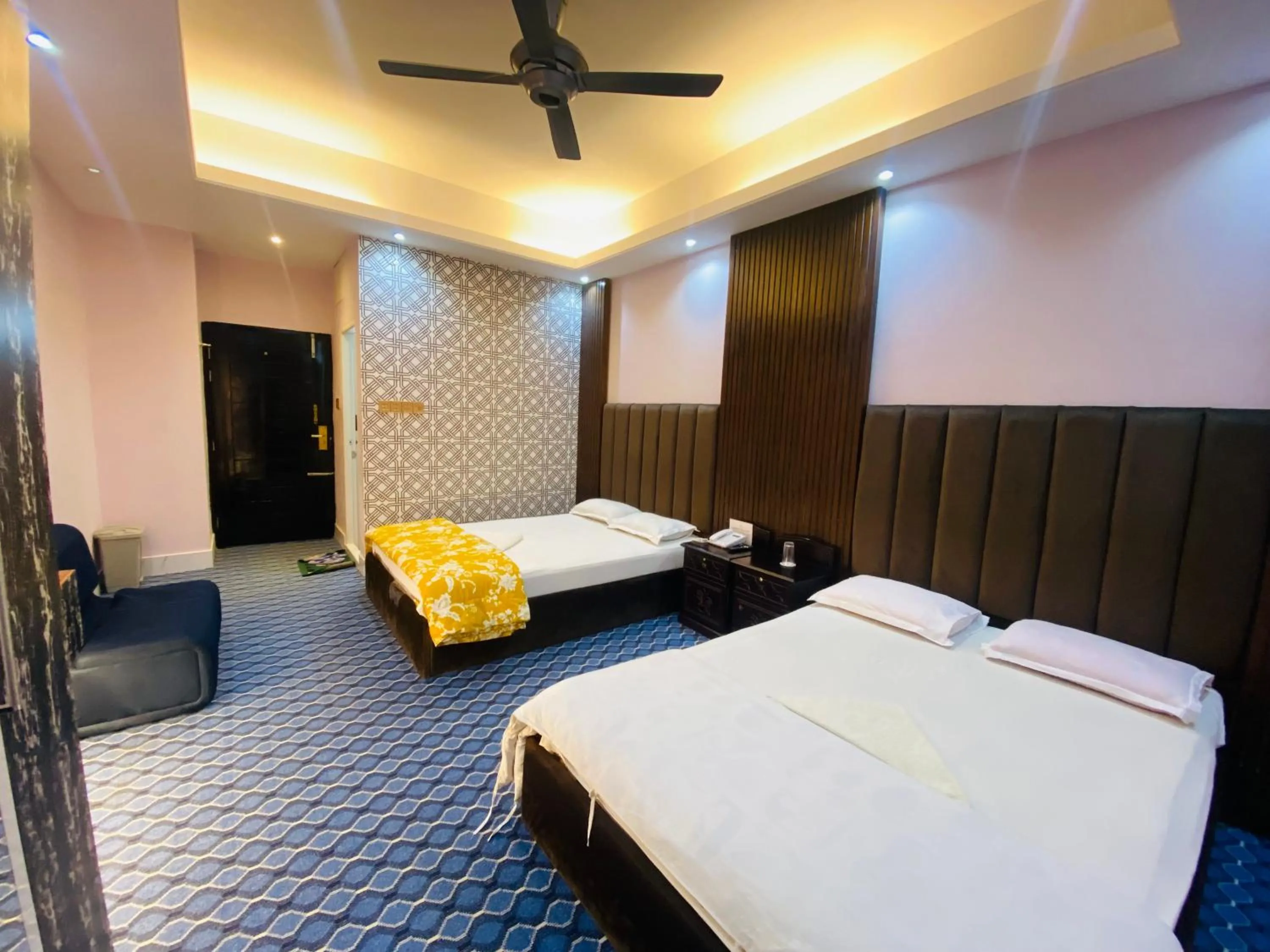 Bed in Hotel Grand Akther