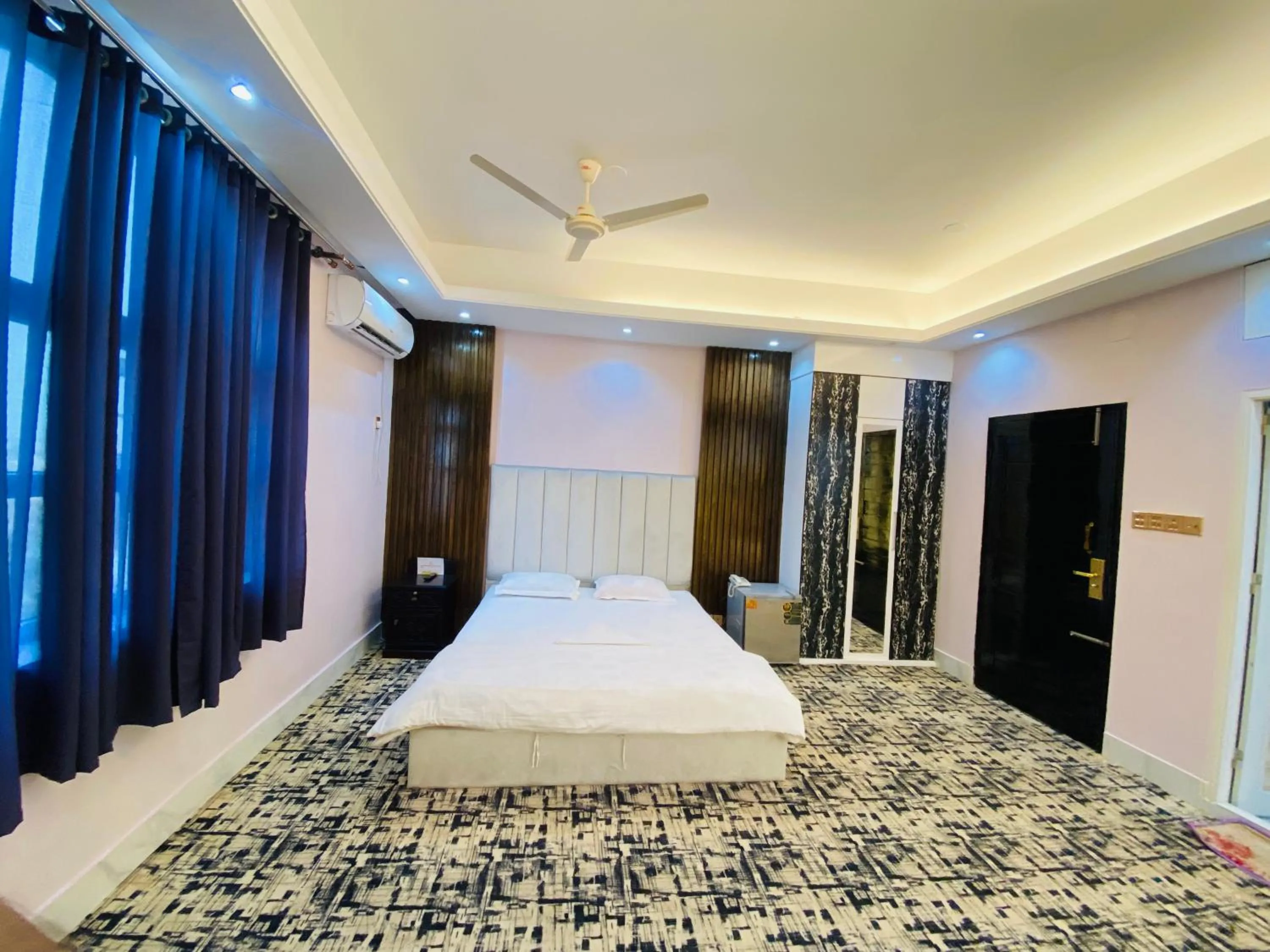 Bed in Hotel Grand Akther