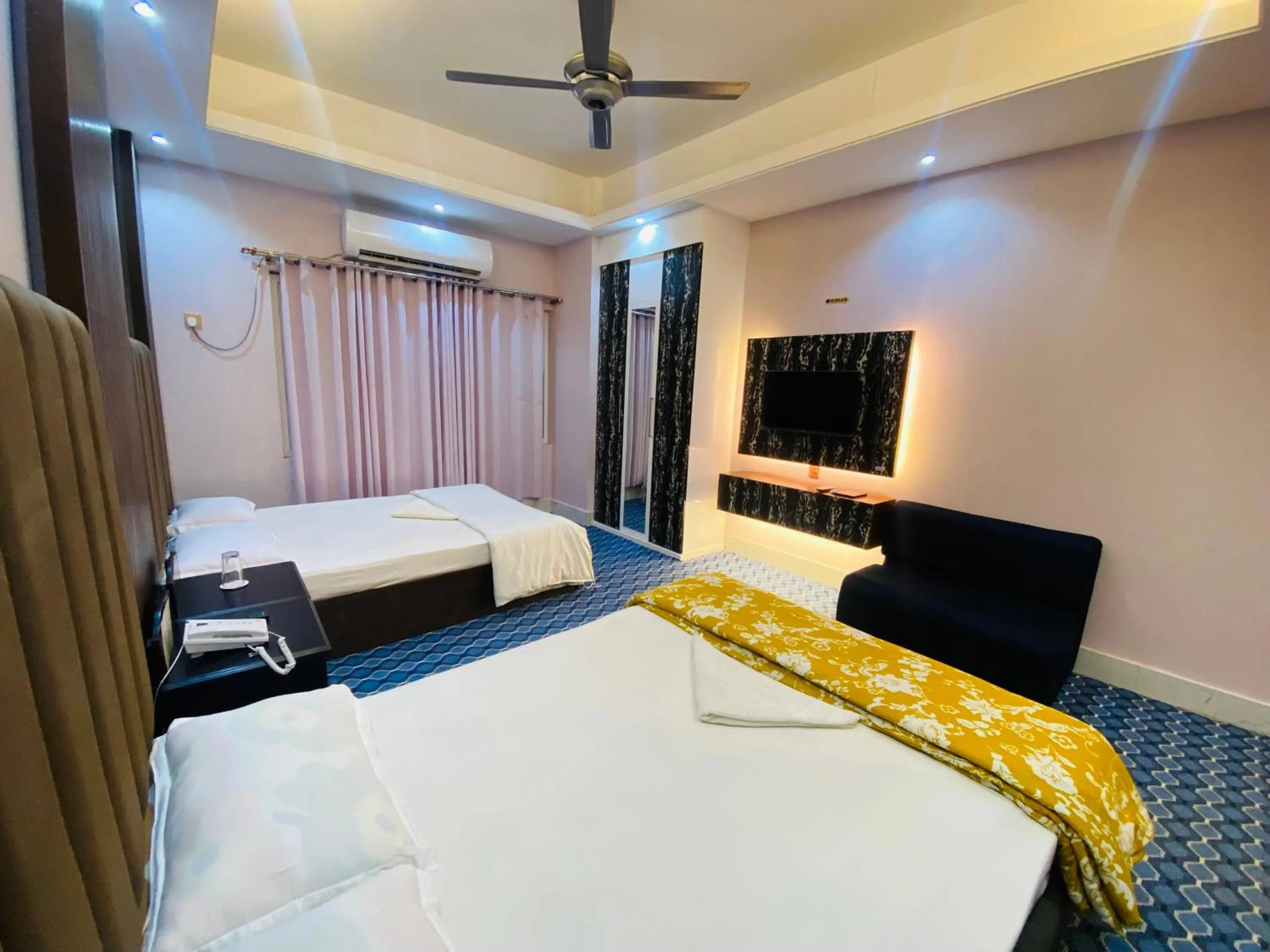 Bed in Hotel Grand Akther