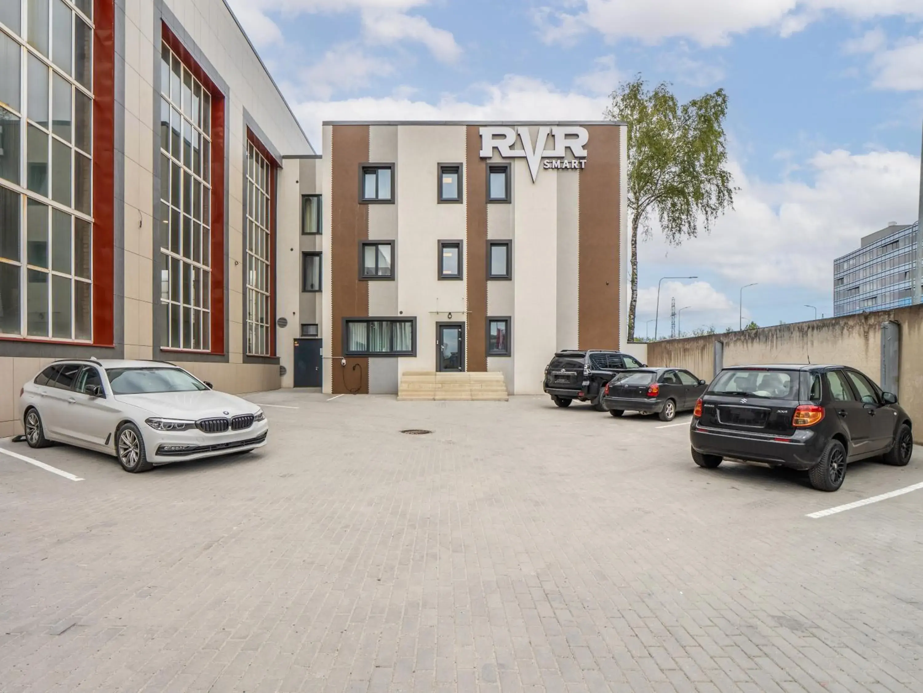 Property building in RVR Smart Apartments Riga with Free Parking and Self Check-in Property building in RVR Smart Apartments Riga with Free Parking and Self Check-in