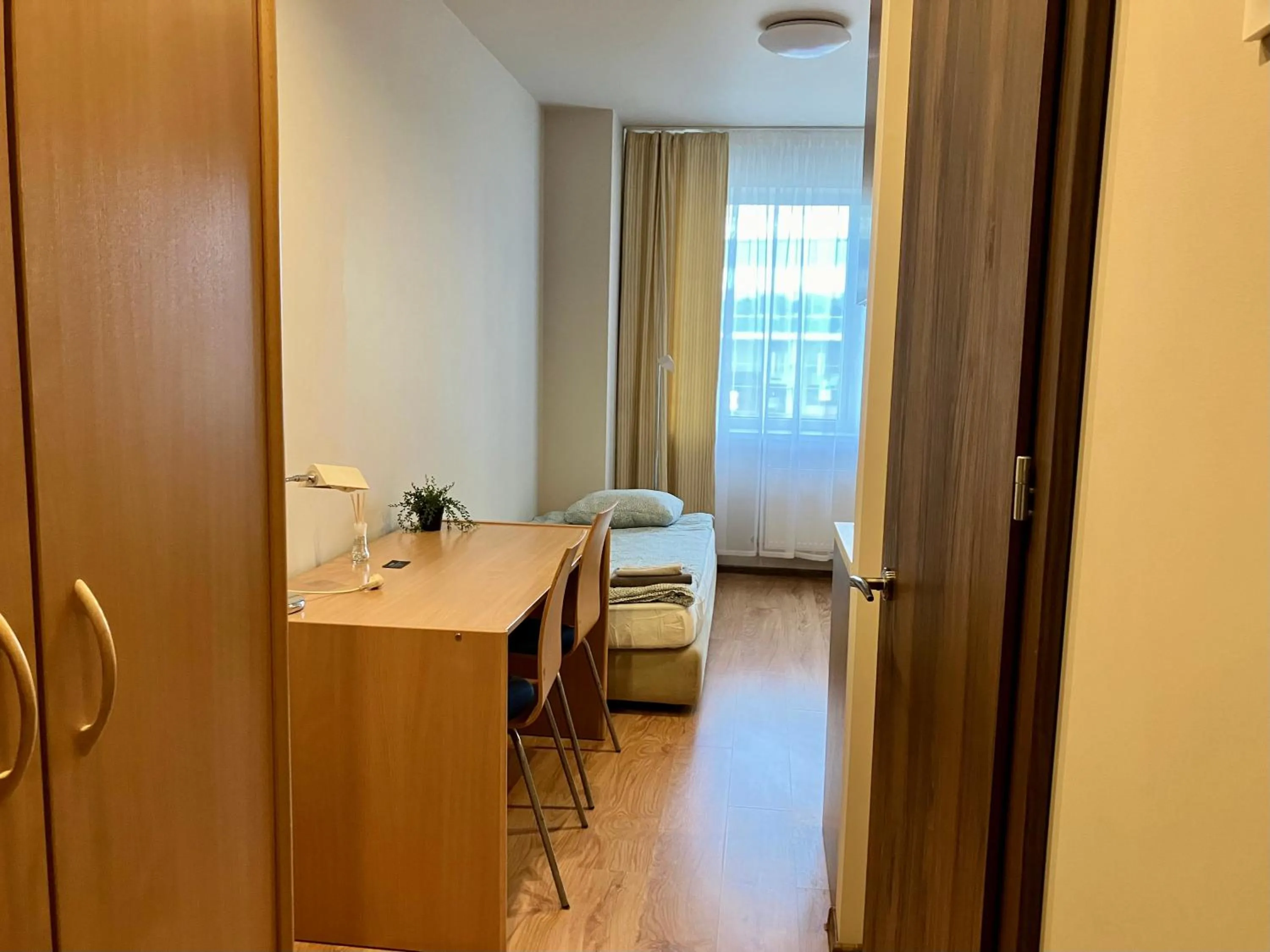 Photo of the whole room, Bed in RVR Smart Apartments Riga with Free Parking and Self Check-in